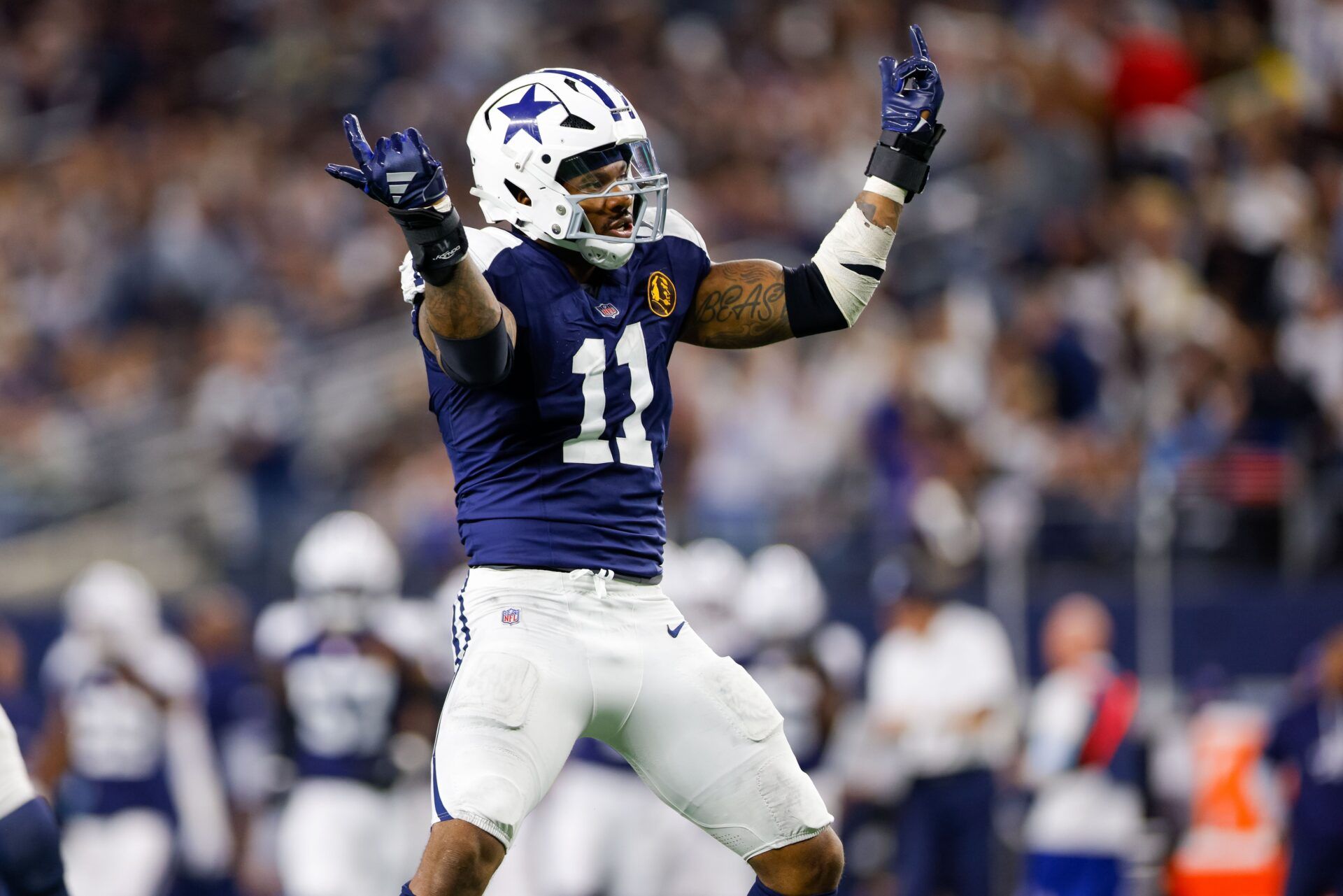 Dallas Cowboys linebacker Micah Parsons (11) celebrates after a sack during the third quarter against the New York Giants at AT&T Stadium.