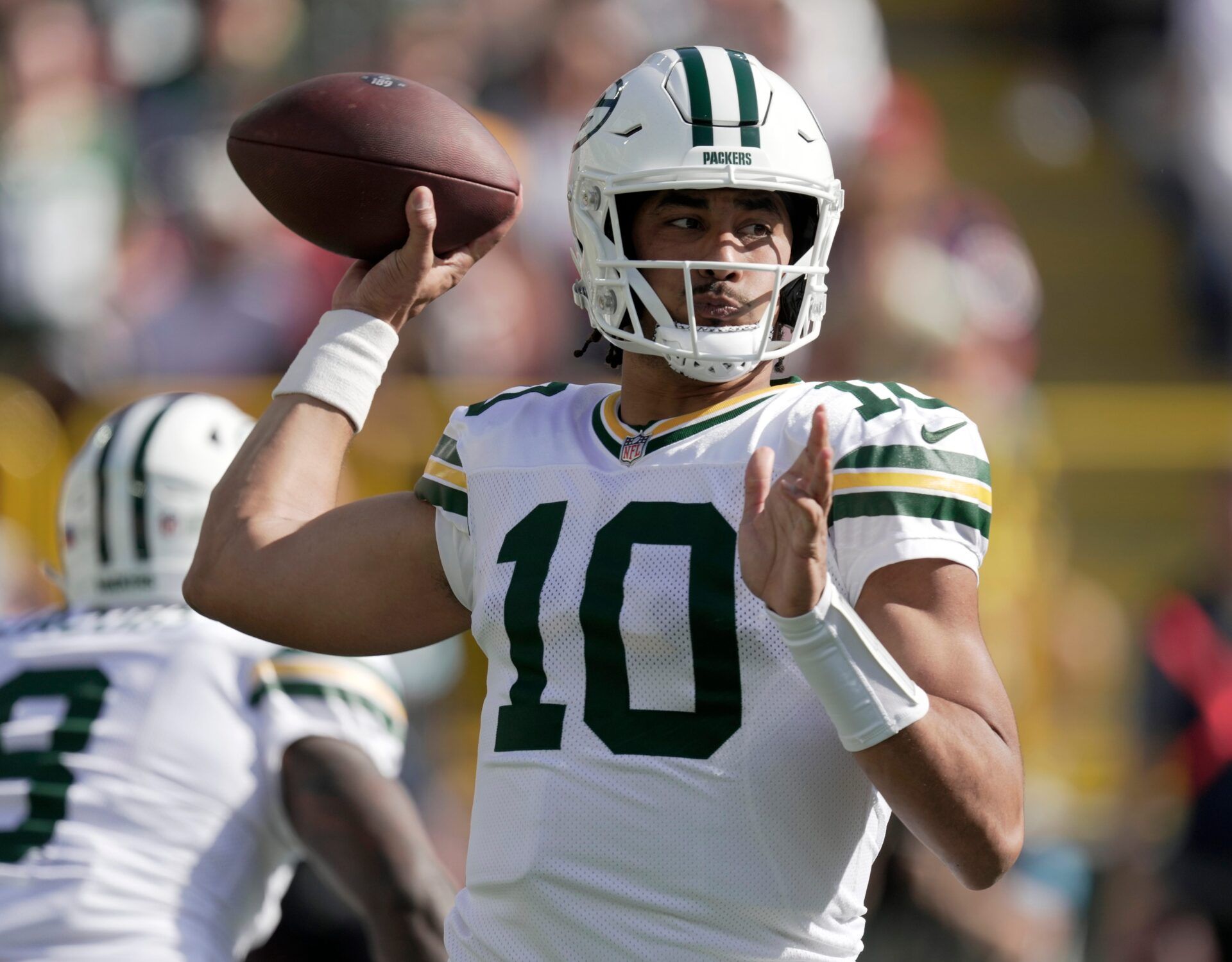 Green Bay Packers quarterback Jordan Love (10) throws a pass during the first quarter of their game against the Houston Texans Sunday, October 20, 2024 at Lambeau Field in Green Bay, Wisconsin.