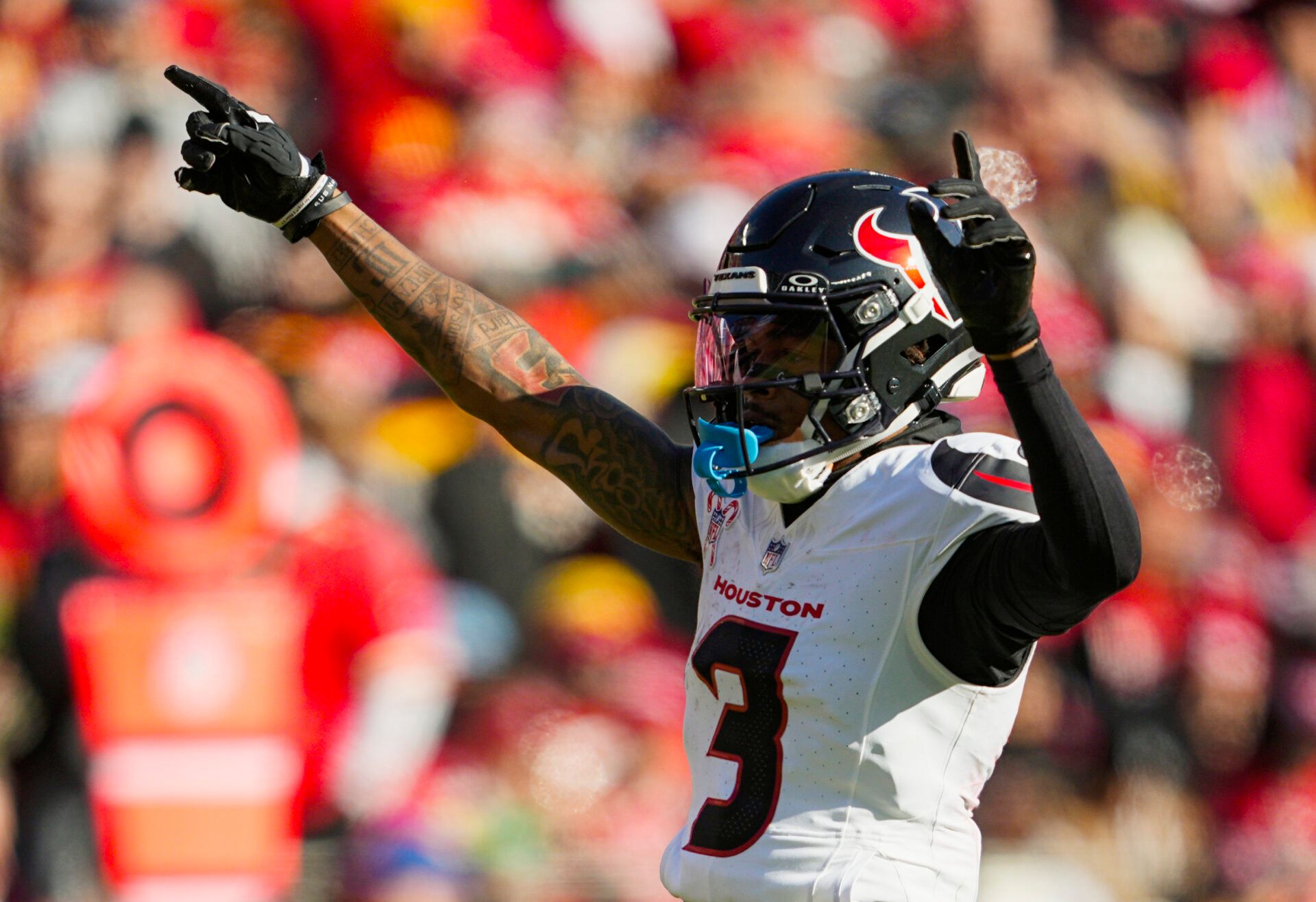 Dec 21, 2024; Kansas City, Missouri, USA; Houston Texans wide receiver Tank Dell (3) celebrates after a play during the first half against the Kansas City Chiefs at GEHA Field at Arrowhead Stadium. Mandatory Credit: Jay Biggerstaff-Imagn Images