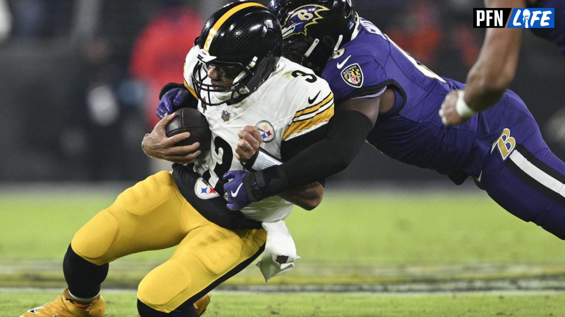 ho tacklers Pittsburgh Steelers quarterback Russell Wilson (3) during the first half at M&T Bank Stadium.