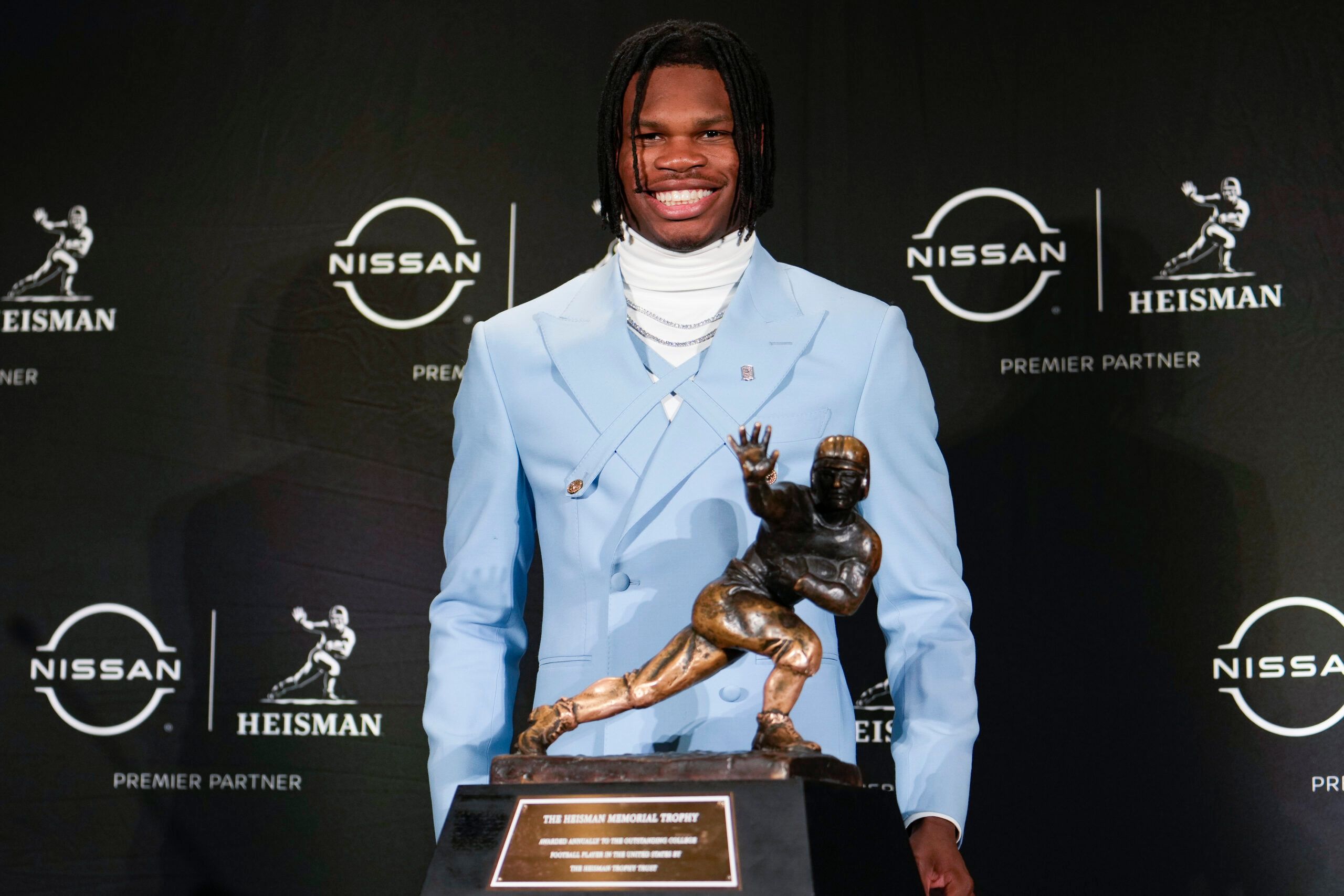 Colorado Buffaloes wide receiver/cornerback Travis Hunter poses for a photo during a press conference before the 2024 Heisman Trophy Presentation.