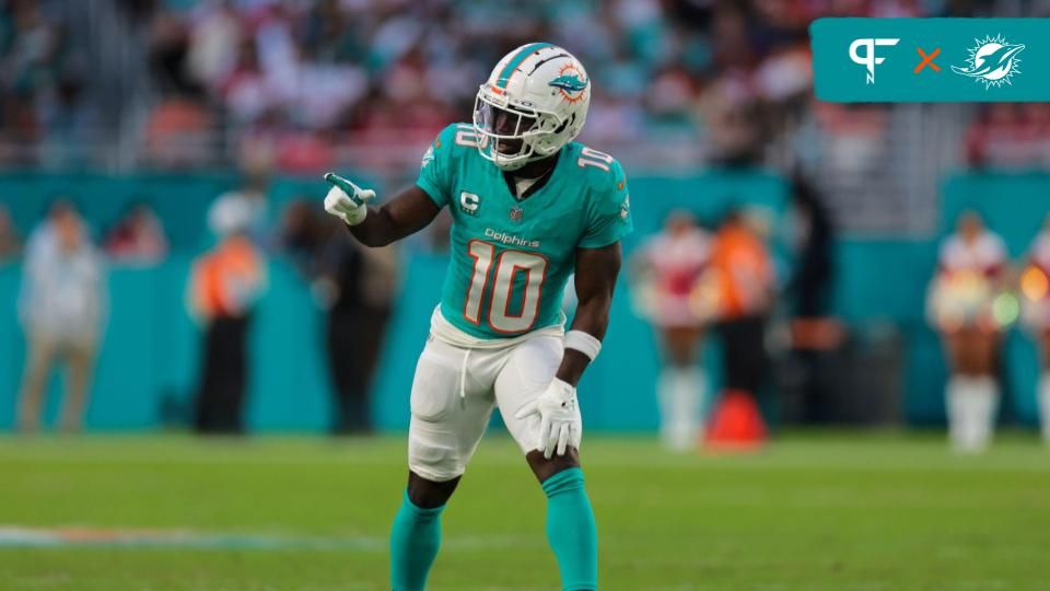 Miami Dolphins wide receiver Tyreek Hill (10) signals from the line of scrimmage against the San Francisco 49ers during the second quarter at Hard Rock Stadium.