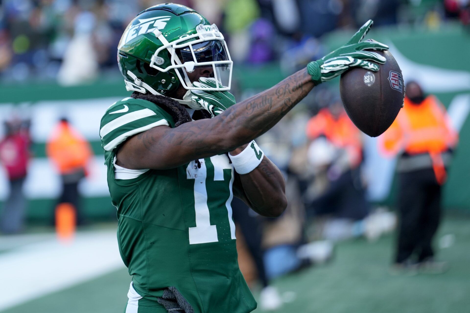 New York Jets wide receiver Davante Adams (17) celebrates after getting on the scoreboard first with a first quarter touchdown, Sunday, December 22, 2024, in East Rutherford.