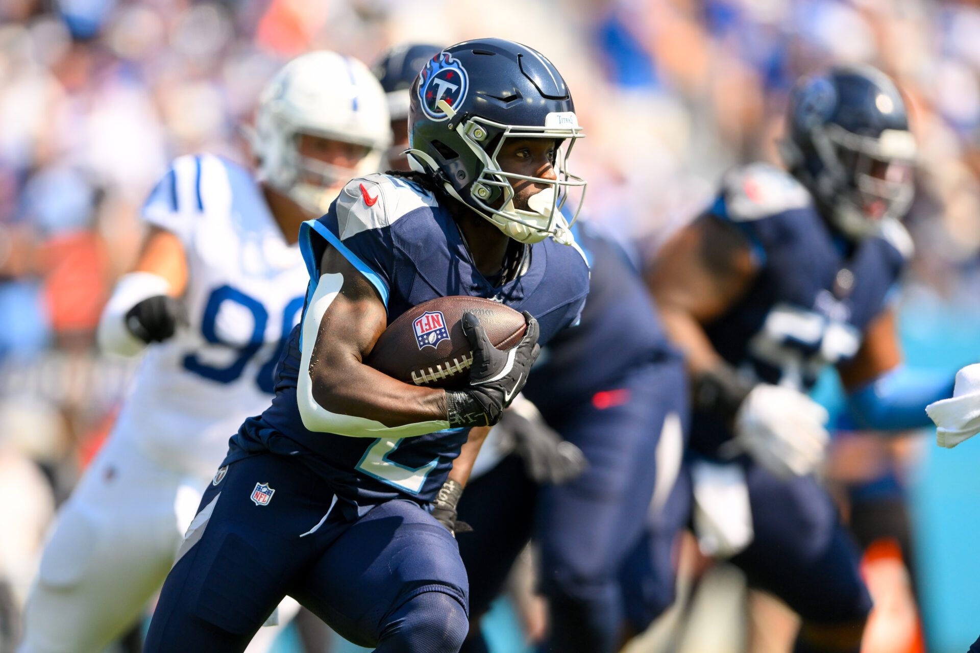 Oct 13, 2024; Nashville, Tennessee, USA; Tennessee Titans running back Tyjae Spears (2) runs the ball against the Indianapolis Colts during the first half at Nissan Stadium. Mandatory Credit: Steve Roberts-Imagn Images