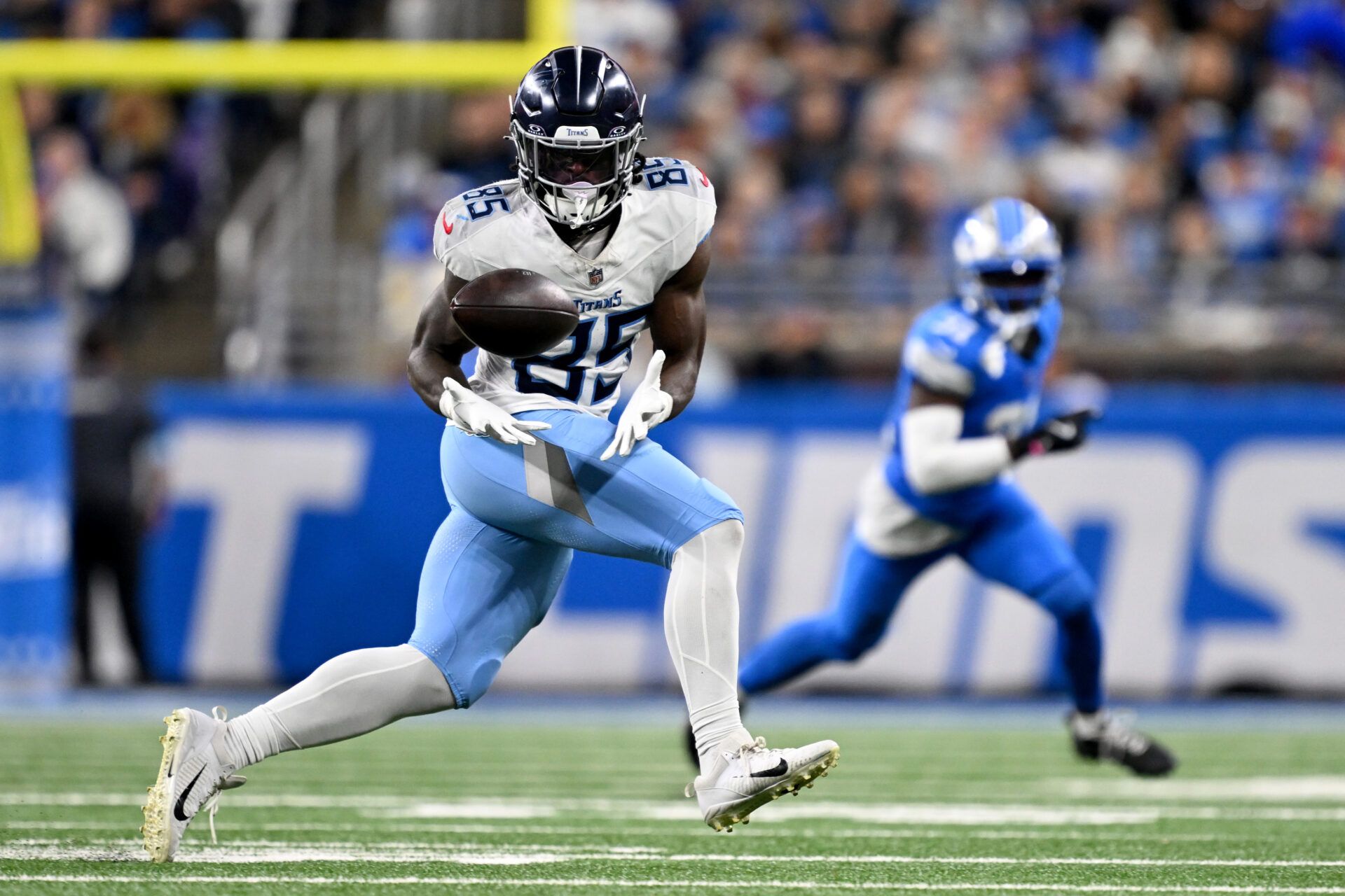 Oct 27, 2024; Detroit, Michigan, USA; Tennessee Titans tight end Chig Okonkwo (85) catches a pass against the Detroit Lions in the third quarter at Ford Field. Mandatory Credit: Lon Horwedel-Imagn Images