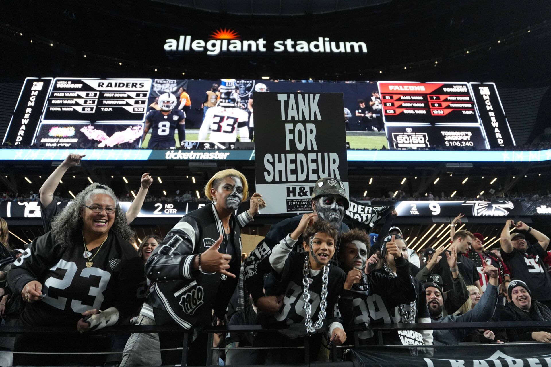 Las Vegas Raiders fans hold a sign that reads Tank for Shedeur Sanders during the game against the Atlanta Falcons at Allegiant Stadium.