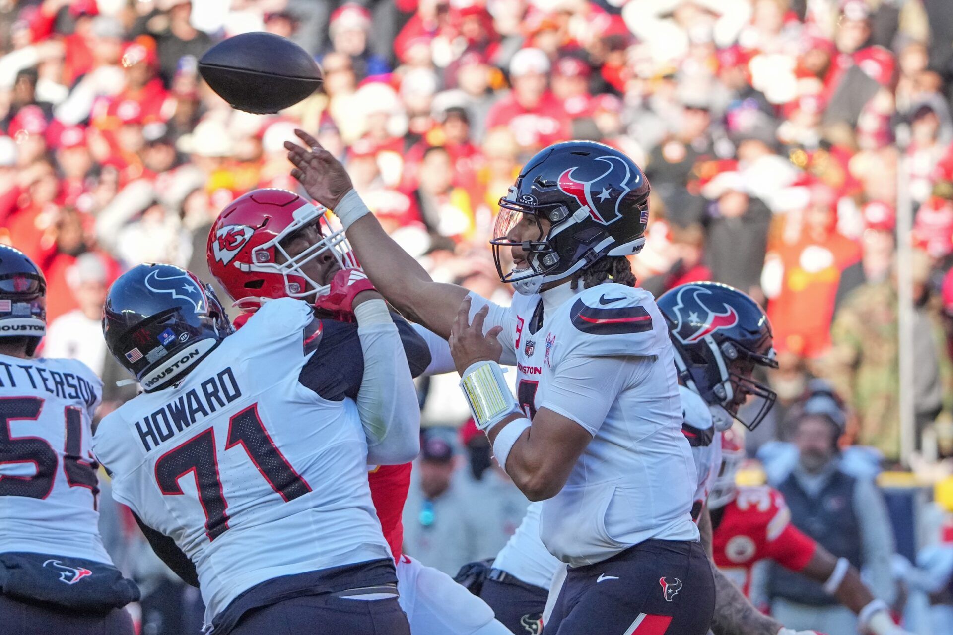 Houston Texans quarterback C.J. Stroud (7) throws a pass against the Kansas City Chiefs during the second half at GEHA Field at Arrowhead Stadium.