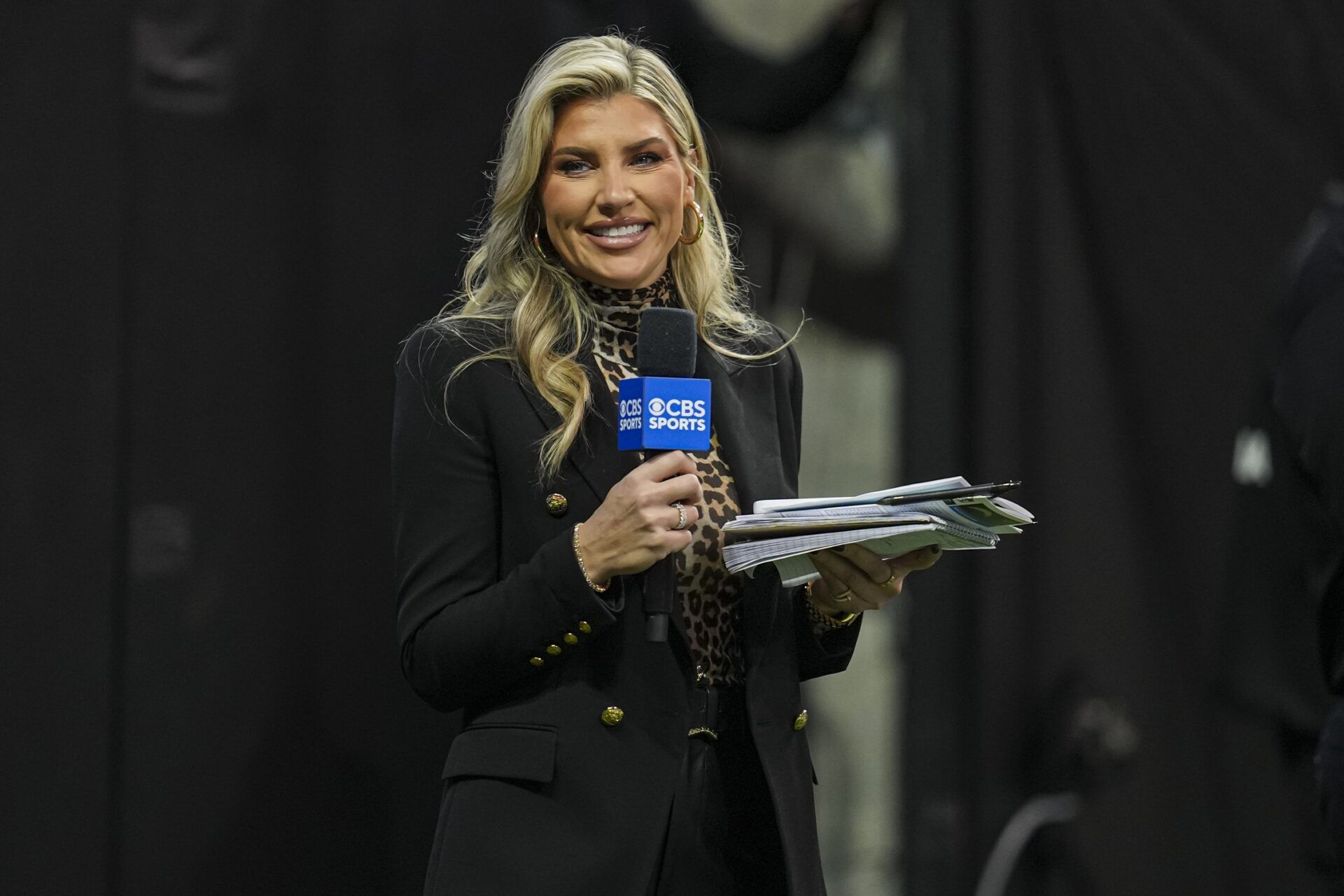 CBS Sports sideline reporter Melanie Collins on the field before the game between the Atlanta Falcons against the Los Angeles Chargers at Mercedes-Benz Stadium.