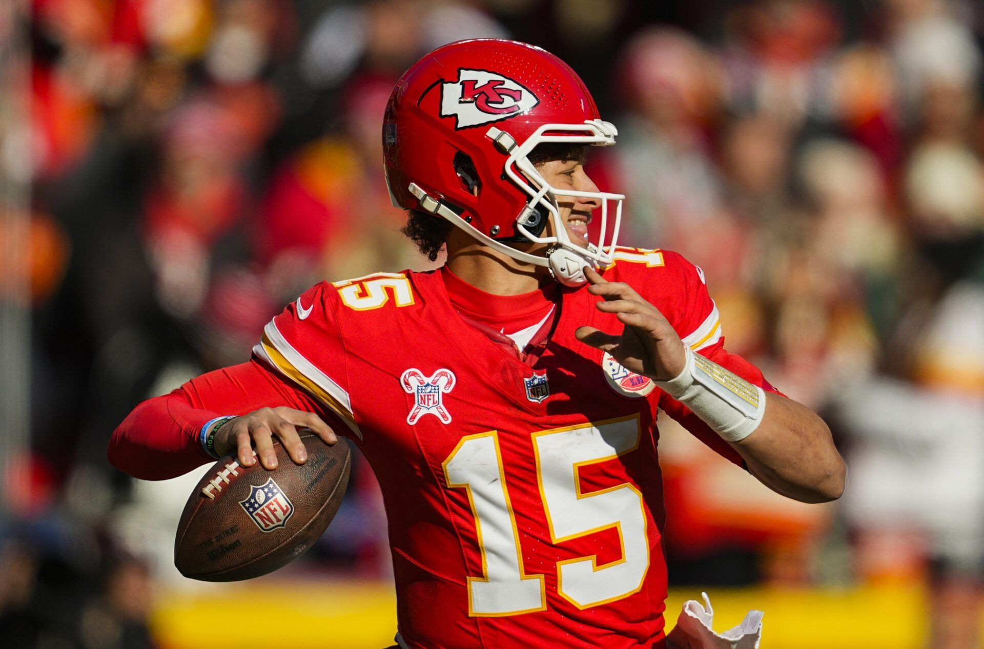 Kansas City Chiefs quarterback Patrick Mahomes (15) throws a pass during the first half against the Houston Texans at GEHA Field at Arrowhead Stadium.