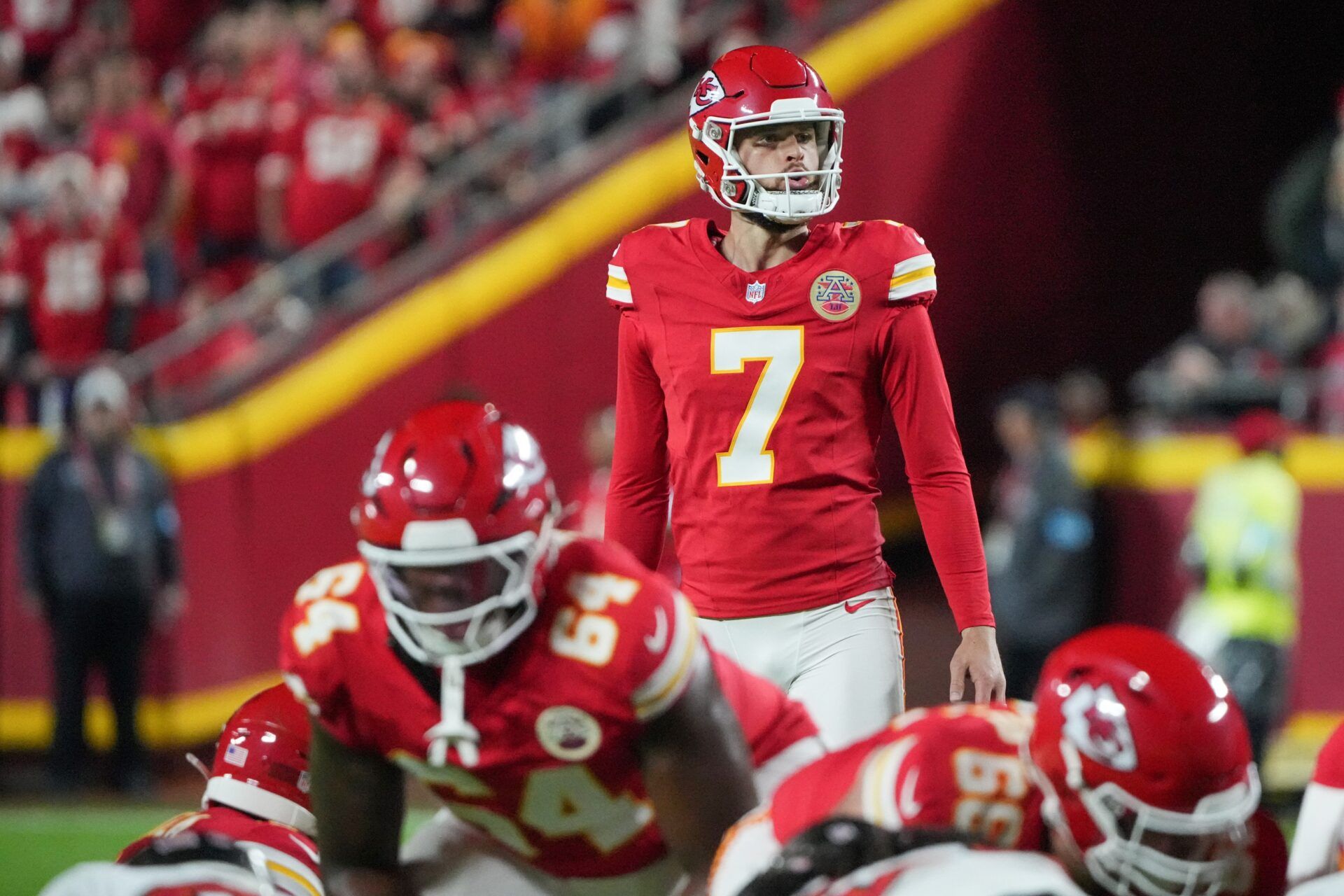 Kansas City Chiefs place kicker Harrison Butker (7) prepares to kick a field goal against the Tampa Bay Buccaneers during the game at GEHA Field at Arrowhead Stadium.