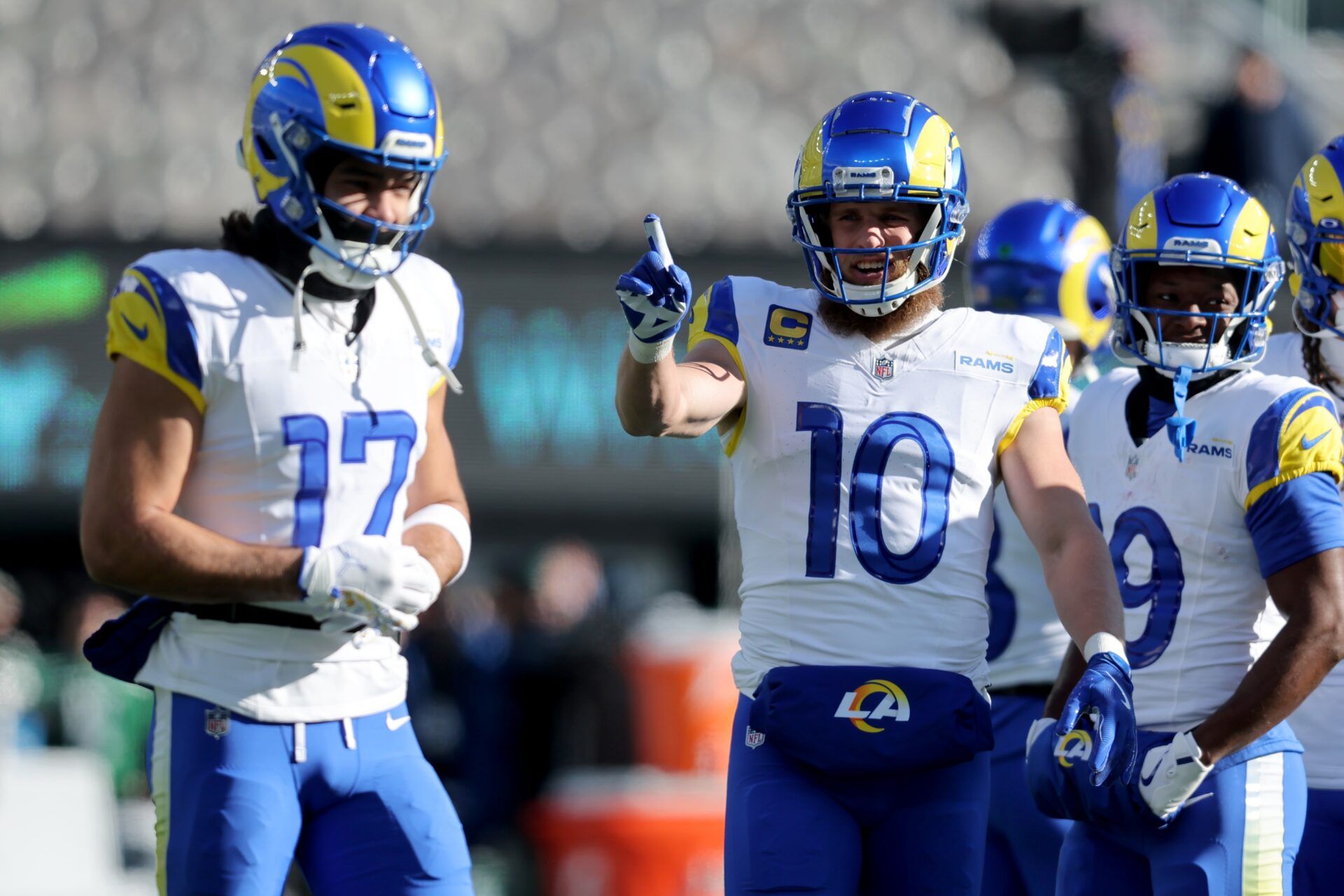 Los Angeles Rams wide receiver Cooper Kupp (10) points in the direction of wide receiver Puka Nacua (17) during warm ups before a game against the New York Jets at MetLife Stadium.