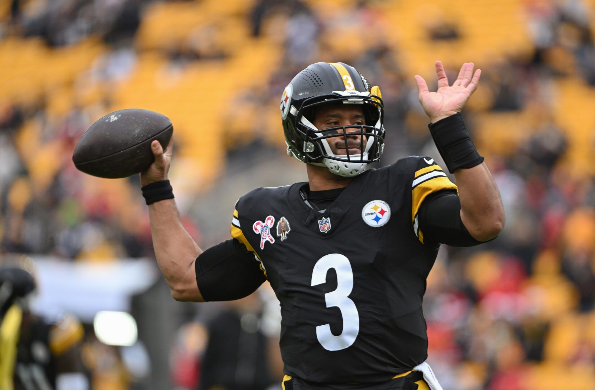 Pittsburgh Steelers quarterback Russell Wilson (3) warms up against the Kansas City Chiefs at Acrisure Stadium.