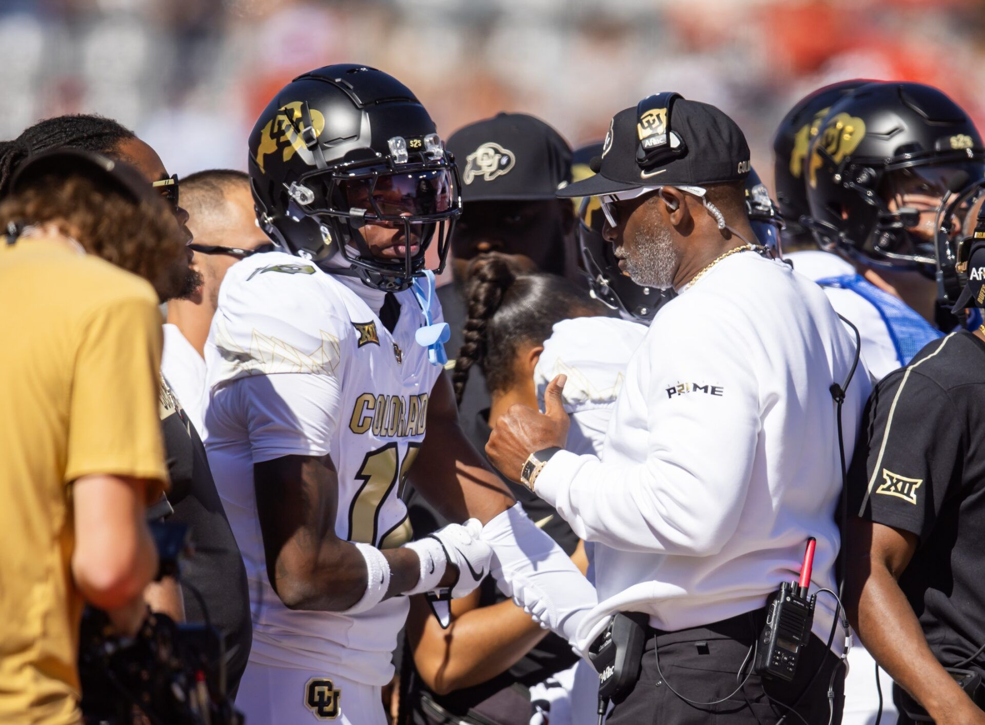 Colorado Buffalos wide receiver Travis Hunter (12) with head coach Deion Sanders against the Arizona Wildcats at Arizona Stadium.