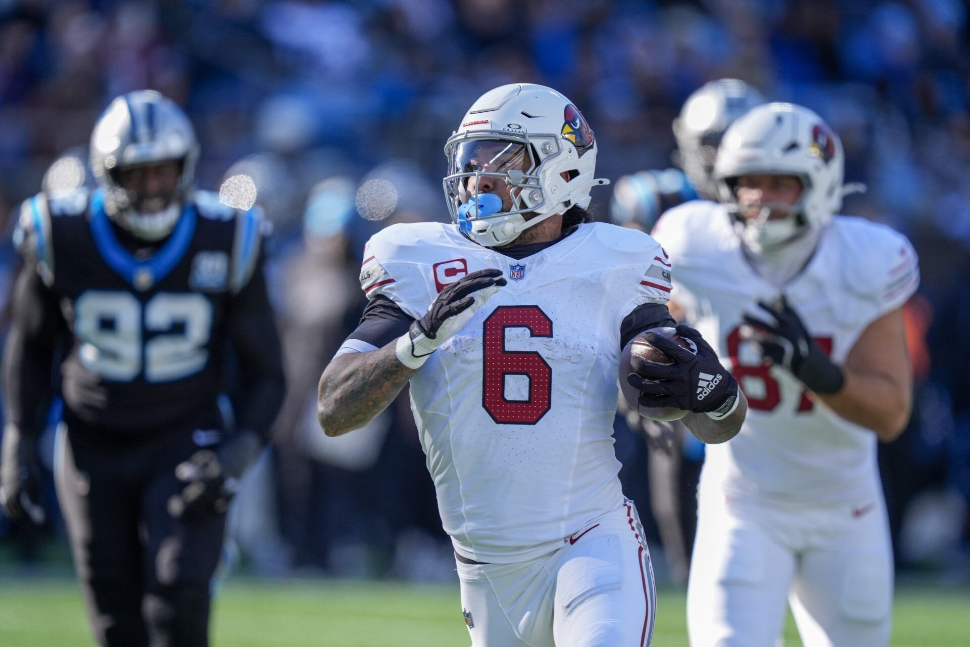 Arizona Cardinals running back James Conner (6) runs for yardage against the Carolina Panthers during the second quarter at Bank of America Stadium.