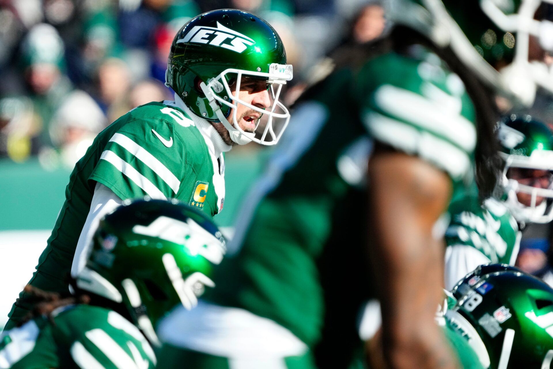 New York Jets quarterback Aaron Rodgers (8) is shown in the first quarter, Sunday, December 22, 2024, in East Rutherford.