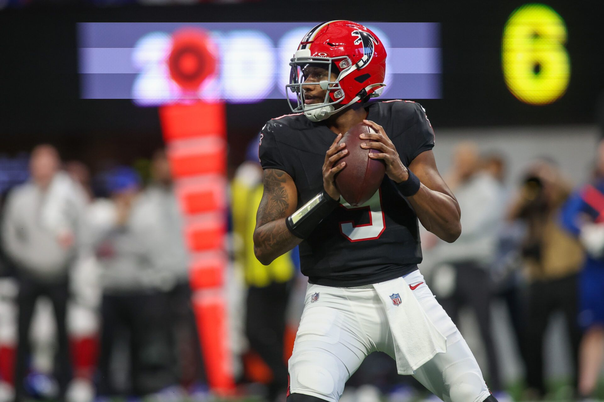 Dec 22, 2024; Atlanta, Georgia, USA; Atlanta Falcons quarterback Michael Penix Jr. (9) drops back to pass against the New York Giants in the second quarter at Mercedes-Benz Stadium. Mandatory Credit: Brett Davis-Imagn Images