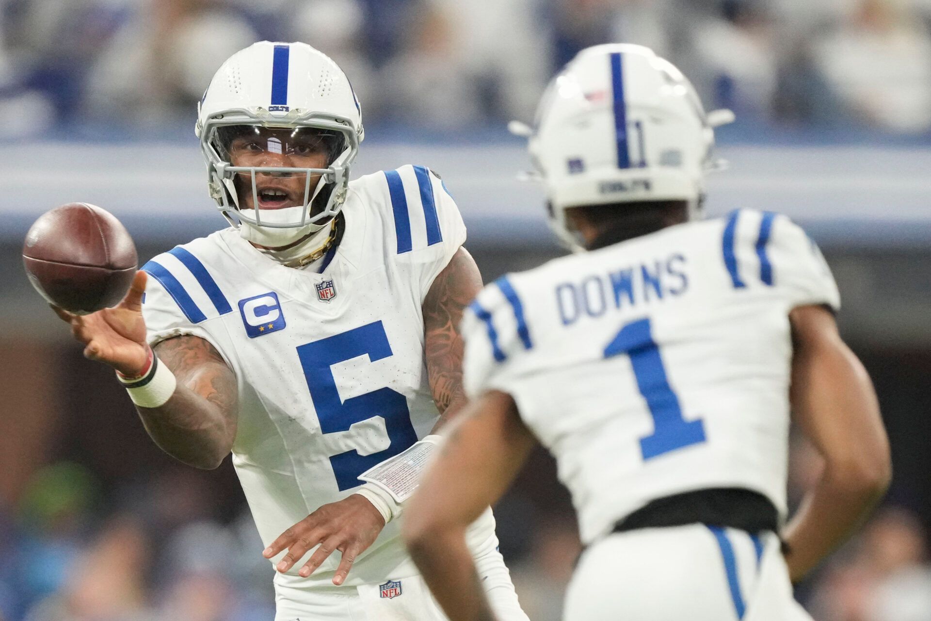 Dec 22, 2024; Indianapolis, Indiana, USA; Indianapolis Colts quarterback Anthony Richardson (5) passes to Indianapolis Colts wide receiver Josh Downs (1) during a game against the Tennessee Titans at Lucas Oil Stadium at Lucas Oil Stadium. Mandatory Credit: Grace Hollars/USA Today Network via Imagn Images