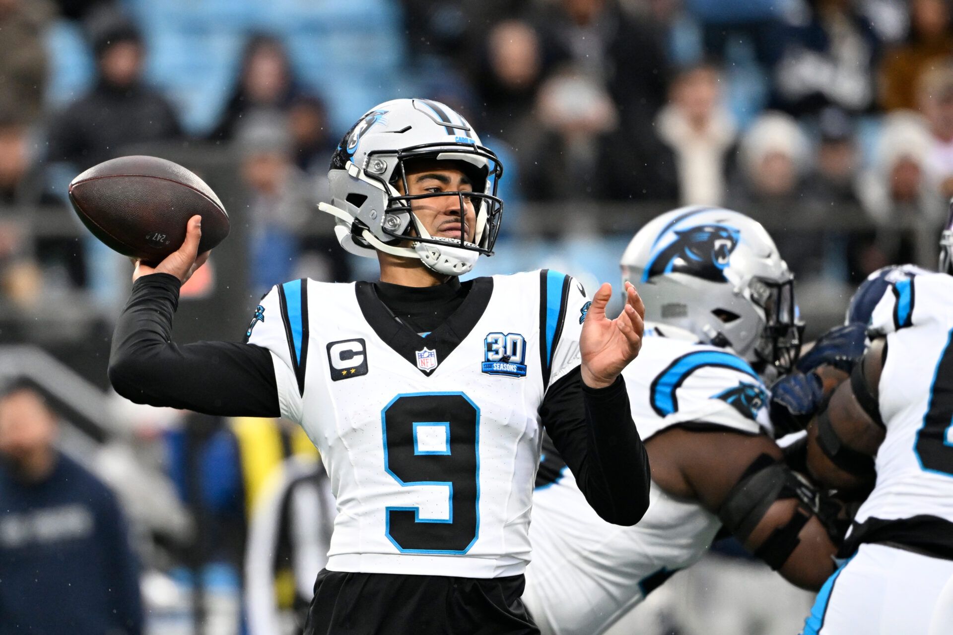 Dec 15, 2024; Charlotte, North Carolina, USA; Carolina Panthers quarterback Bryce Young (9) looks to pass in the fourth quarter at Bank of America Stadium. Mandatory Credit: Bob Donnan-Imagn Images