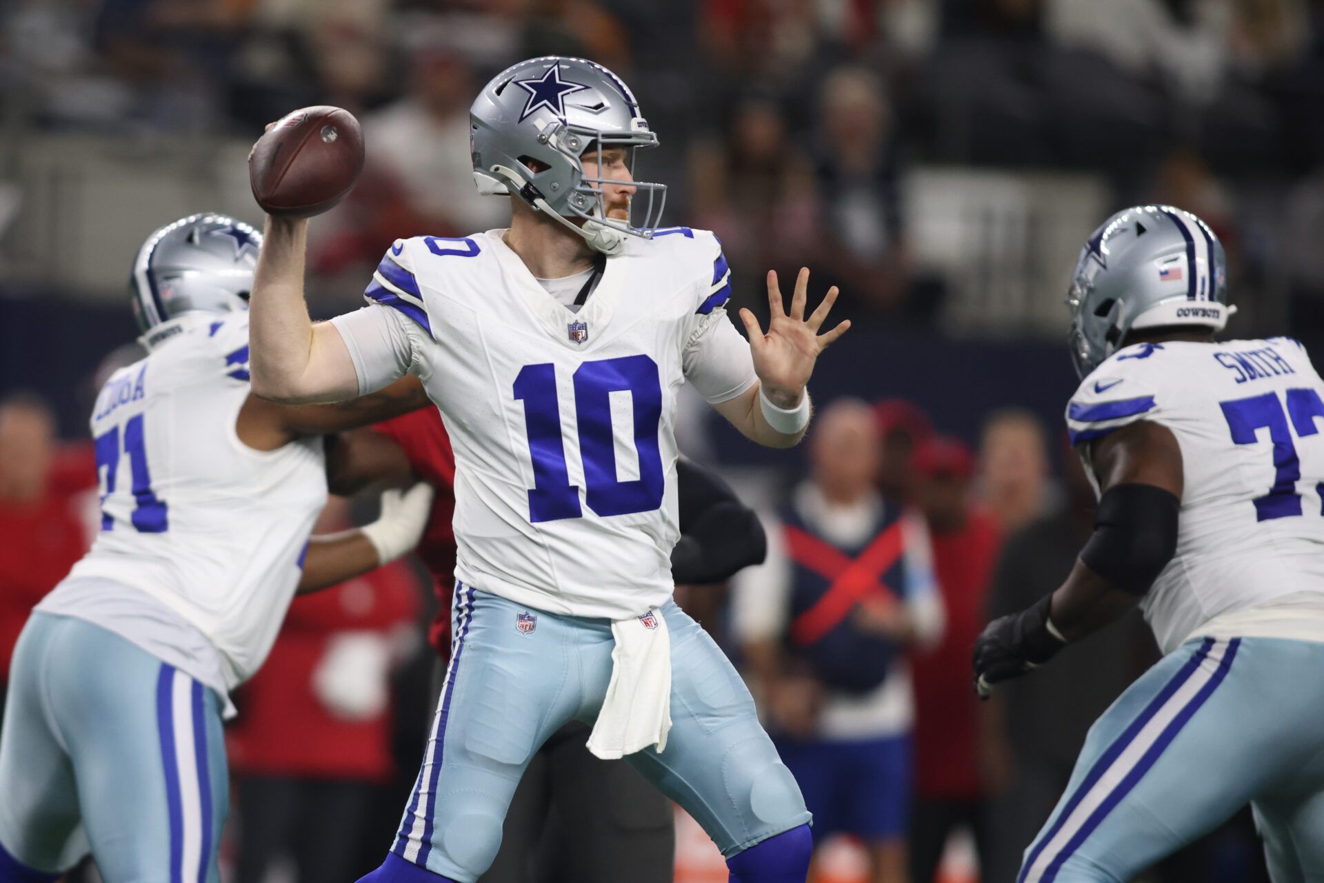 Dec 22, 2024; Arlington, Texas, USA; Dallas Cowboys quarterback Cooper Rush (10) throws a pass against the Tampa Bay Buccaneers in the first quarter at AT&T Stadium. Mandatory Credit: Tim Heitman-Imagn Images