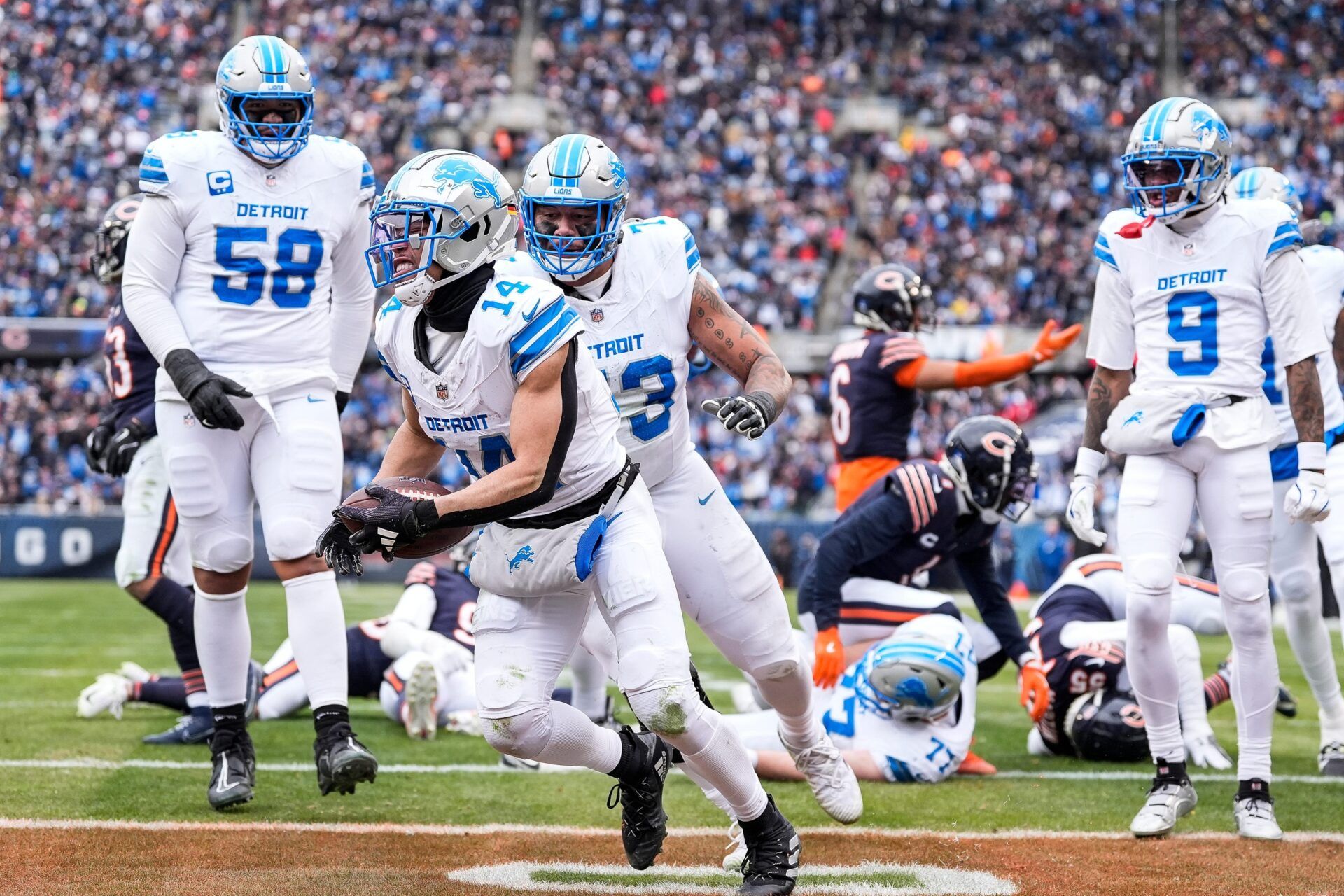 Detroit Lions wide receiver Amon-Ra St. Brown (14) celebrates a touchdown against Chicago Bears during the first half at Soldier Field in Chicago, Ill. on Sunday, Dec. 22, 2024.