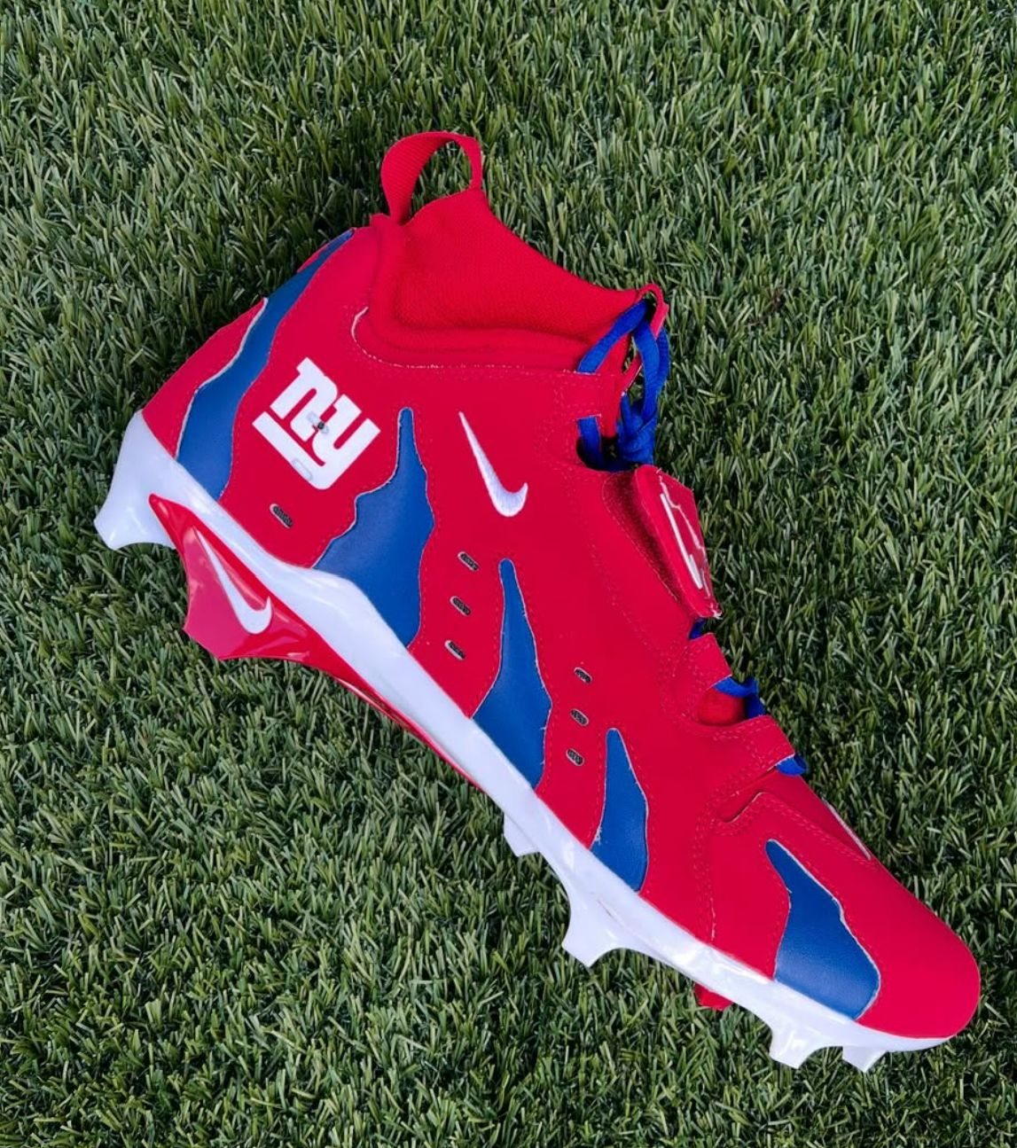 Colorado's Shedeur Sanders' custom New York Giants cleats, which hint he'll be the No. 1 pick in the 2025 NFL Draft.