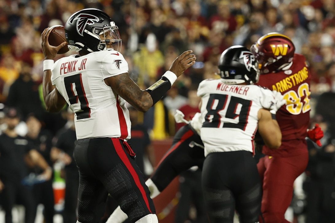 Atlanta Falcons quarterback Michael Penix Jr. (9) passes the ball against the Washington Commanders during the first quarter at Northwest Stadium.