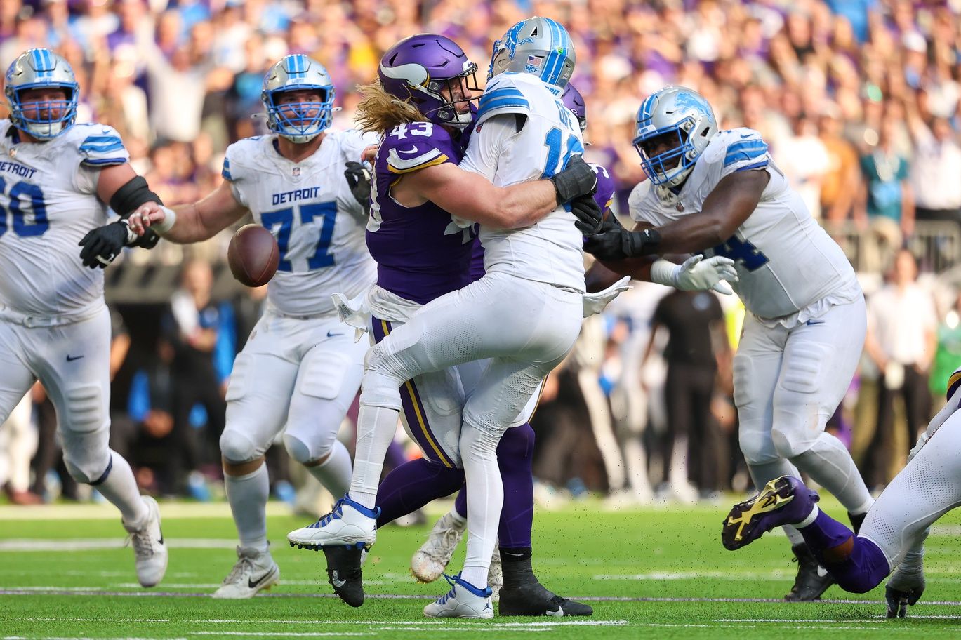 Minnesota Vikings linebacker Andrew Van Ginkel (43) tackles Detroit Lions quarterback Jared Goff (16) during the fourth quarter at U.S. Bank Stadium.