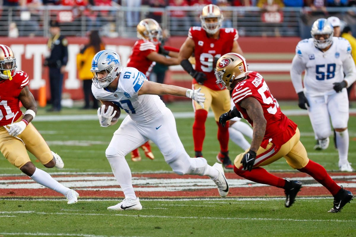 Lions tight end Sam LaPorta runs the ball around 49ers linebacker Dre Greenlaw in the second quarter of the NFC championship game at Levi's Stadium in Santa Clara, California, on Sunday, Jan. 28, 2024.