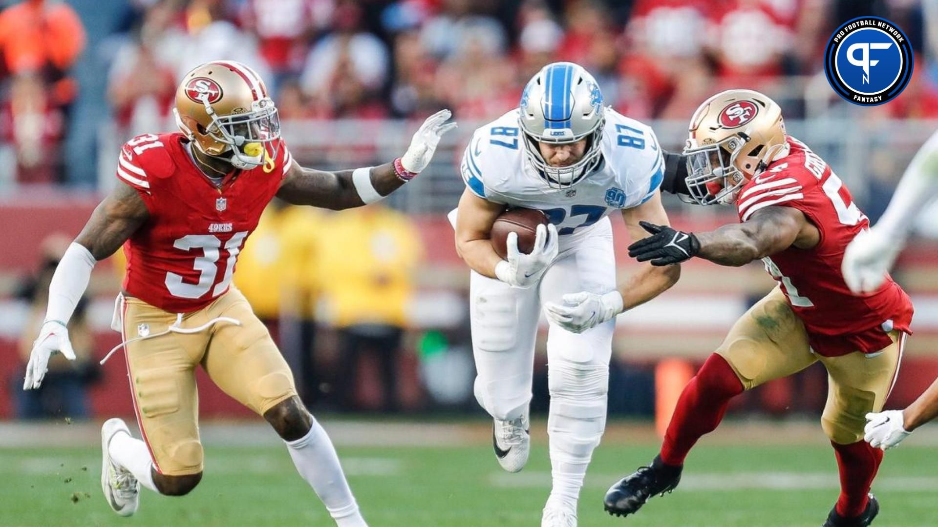 Lions tight end Sam LaPorta runs against 49ers safety Tashaun Gipson Sr., left, during the first half of the NFC championship game at Levi's Stadium in Santa Clara, California, on Sunday, Jan. 28, 2024.