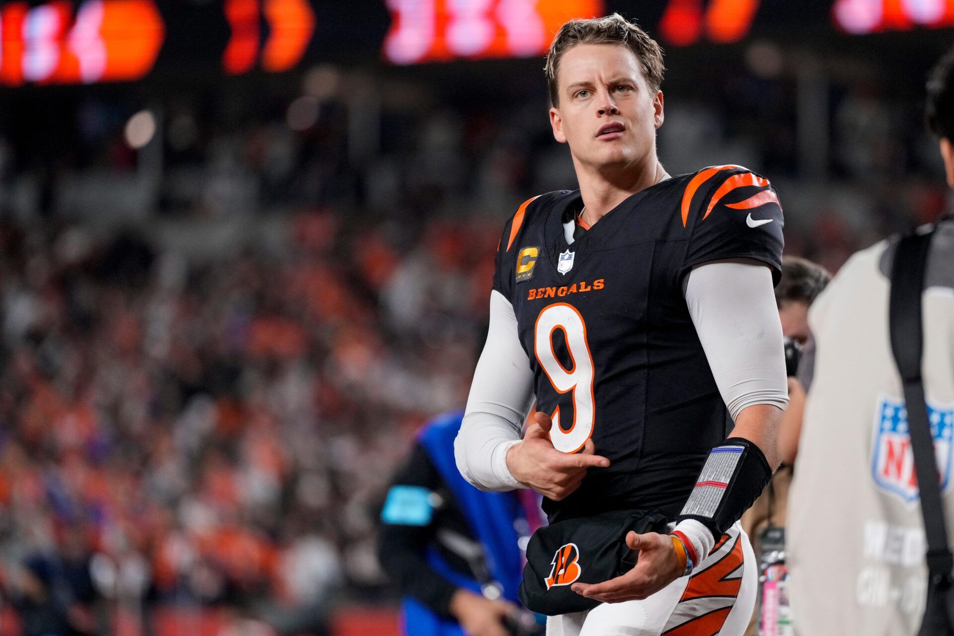 Cincinnati Bengals quarterback Joe Burrow (9) celebrates after the game-winning touchdown pass to Tee Higgins in overtime of the NFL Week 17 game between the Cincinnati Bengals and the Denver Broncos at Paycor Stadium in downtown Cincinnati on Saturday, Dec. 28, 2024. The Bengals took a 30-24 win in overtime to remain in the post season chase.