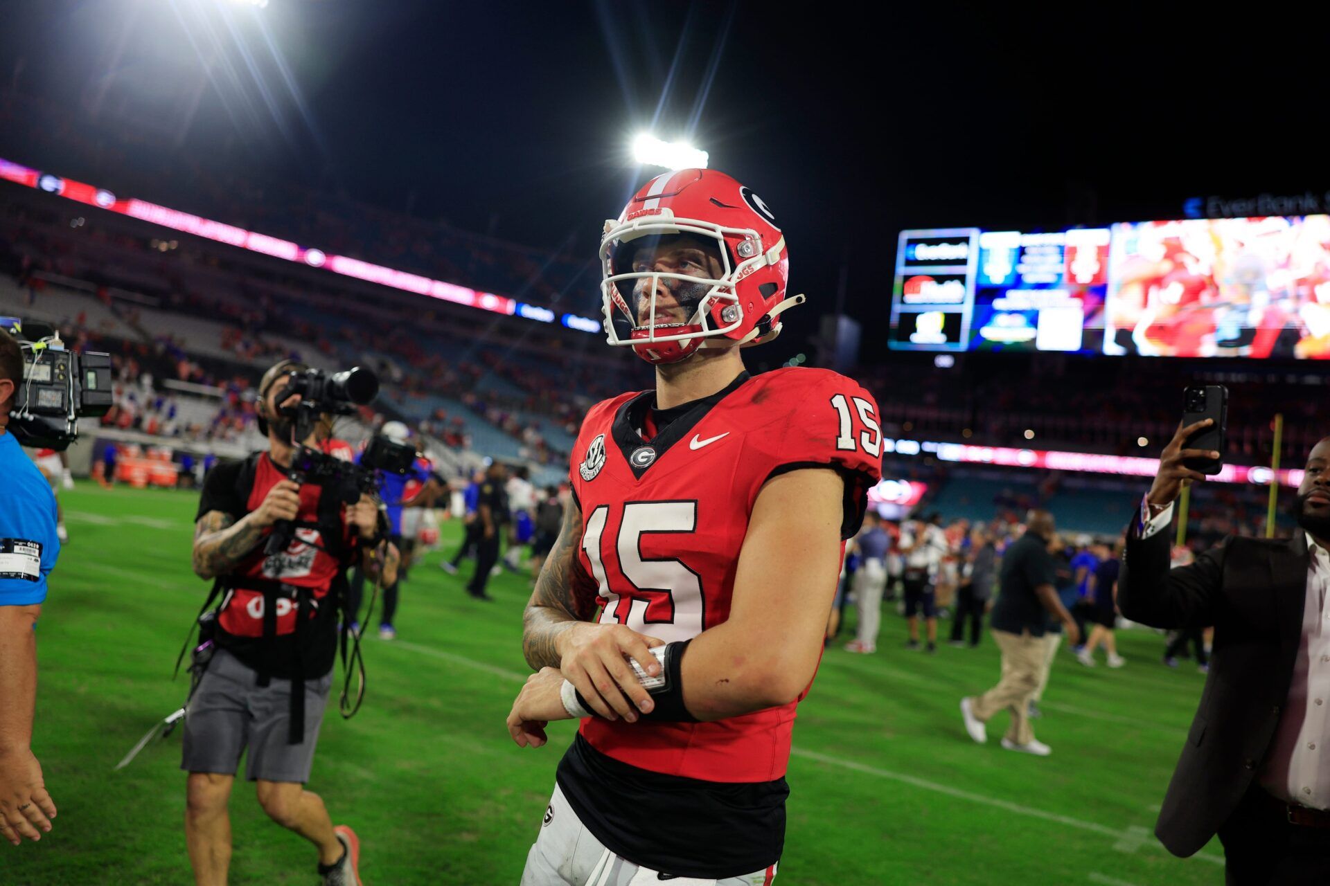 Georgia Bulldogs quarterback Carson Beck (15) walks off the field after the game of an NCAA college football matchup Saturday, Nov. 2, 2024 at EverBank Stadium in Jacksonville, Fla. The Georgia Bulldogs defeated the Florida Gators 34-20.