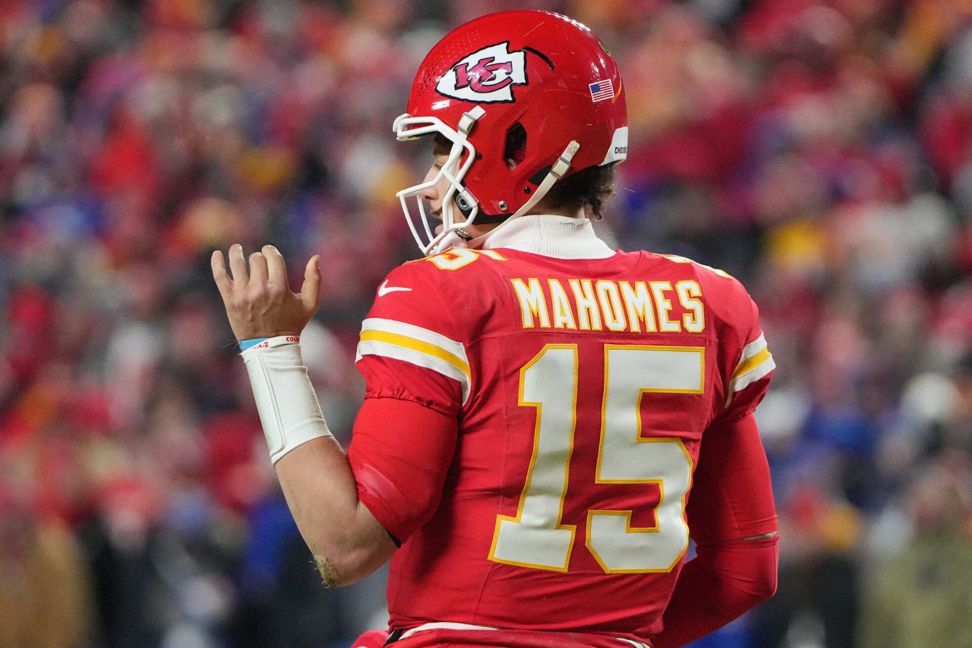 Kansas City Chiefs quarterback Patrick Mahomes (15) reacts after scoring a touchdown against the Buffalo Bills during the second half in the AFC Championship game at GEHA Field at Arrowhead Stadium.