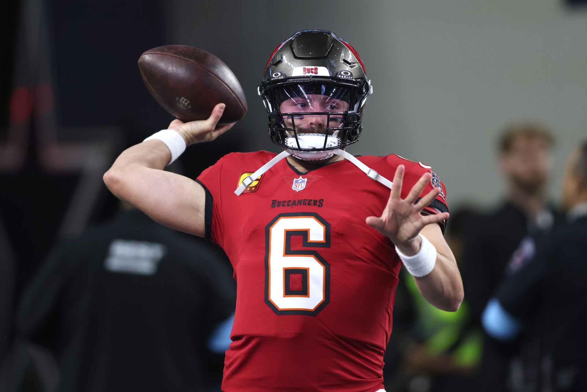 Dec 22, 2024; Arlington, Texas, USA; Tampa Bay Buccaneers quarterback Baker Mayfield (6) throws a pass before the game against the Dallas Cowboys at AT&T Stadium. Mandatory Credit: Tim Heitman-Imagn Images