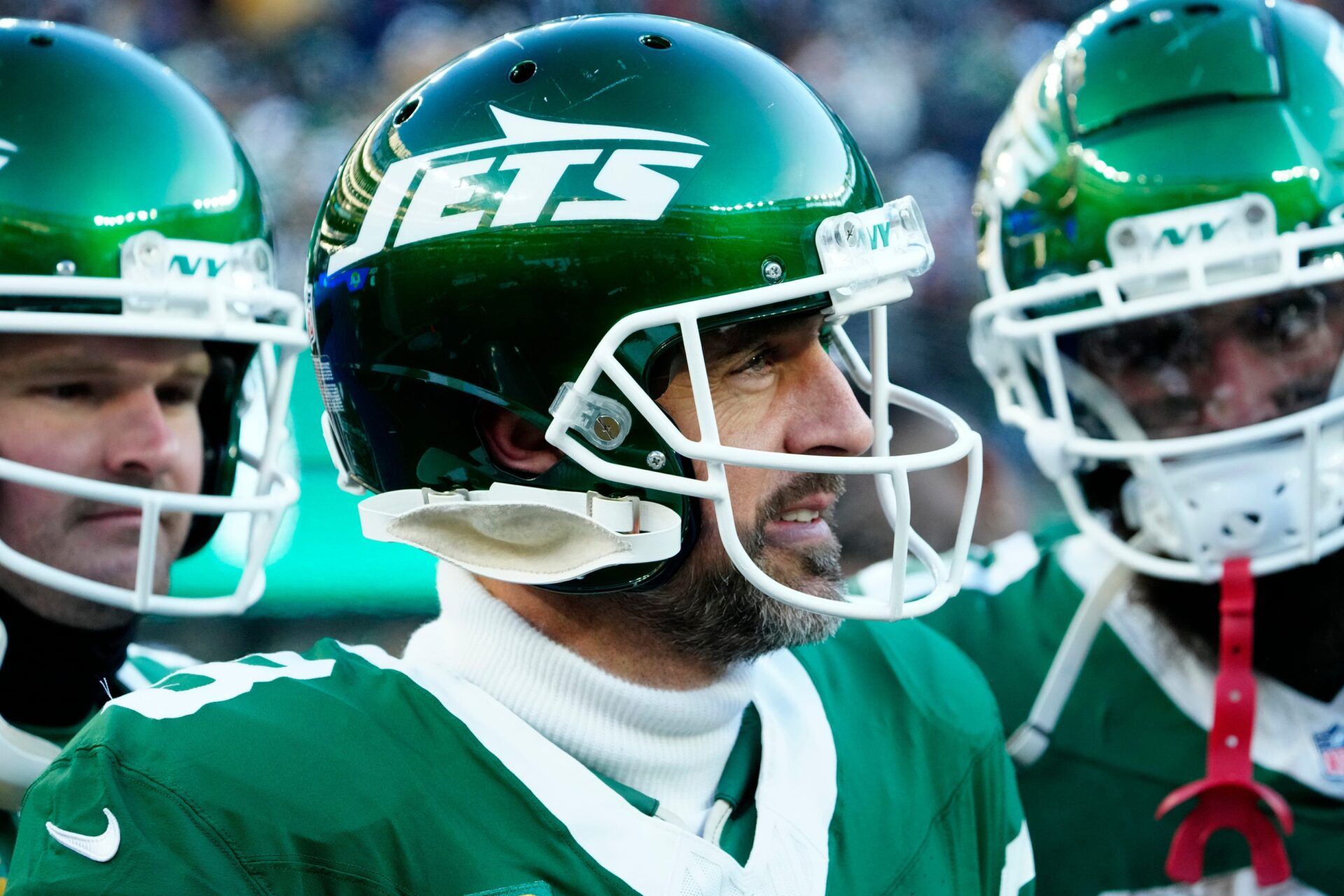 New York Jets quarterback Aaron Rodgers (8) is shown on the sideline during the second quarter, Sunday, December 22, 2024, in East Rutherford.