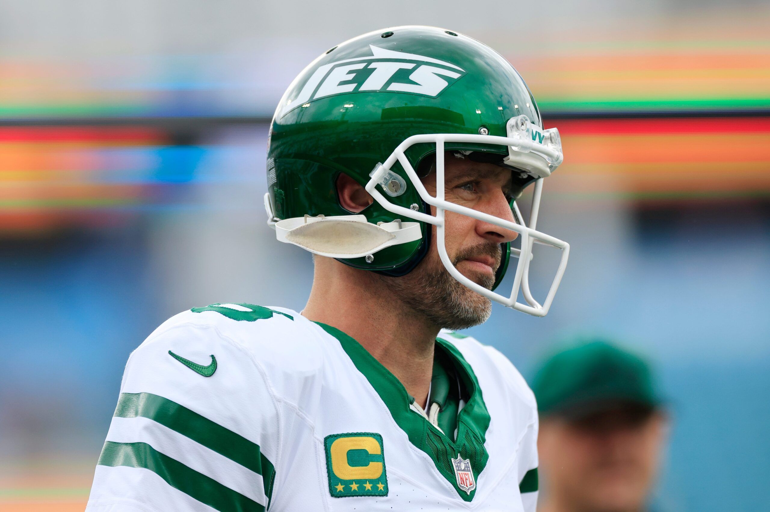 New York Jets quarterback Aaron Rodgers (8) looks on before an NFL football matchup Sunday, Dec. 15, 2024 at EverBank Stadium in Jacksonville, Fla.