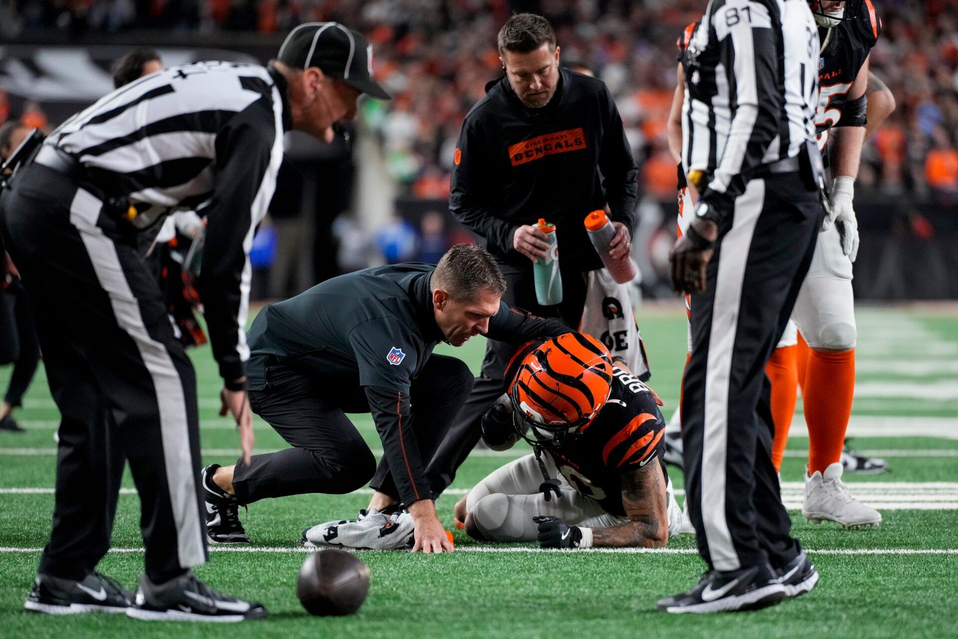 Bengals running back Chase Brown (30) is injured on a carry in the fourth quarter against the Broncos at Paycor Stadium on Saturday, Dec. 28, 2024.