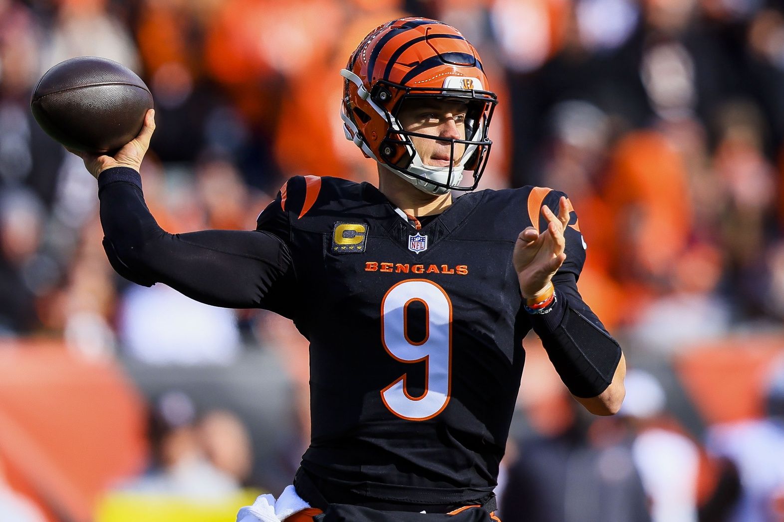 Cincinnati Bengals quarterback Joe Burrow (9) throws a pass against the Cleveland Browns in the first half at Paycor Stadium.