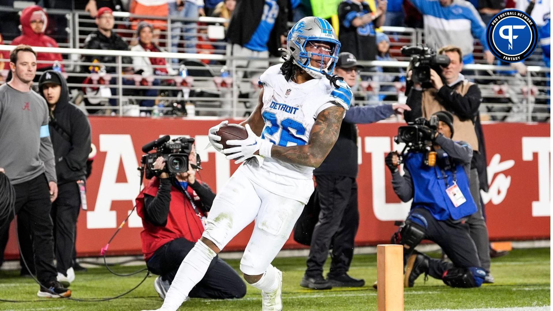 Detroit Lions running back Jahmyr Gibbs (26) runs for a touchdown against San Francisco 49ers safety Talanoa Hufanga (29) during the second half at Levi's Stadium in Santa Clara, Calif. on Monday, Dec. 30, 2024.