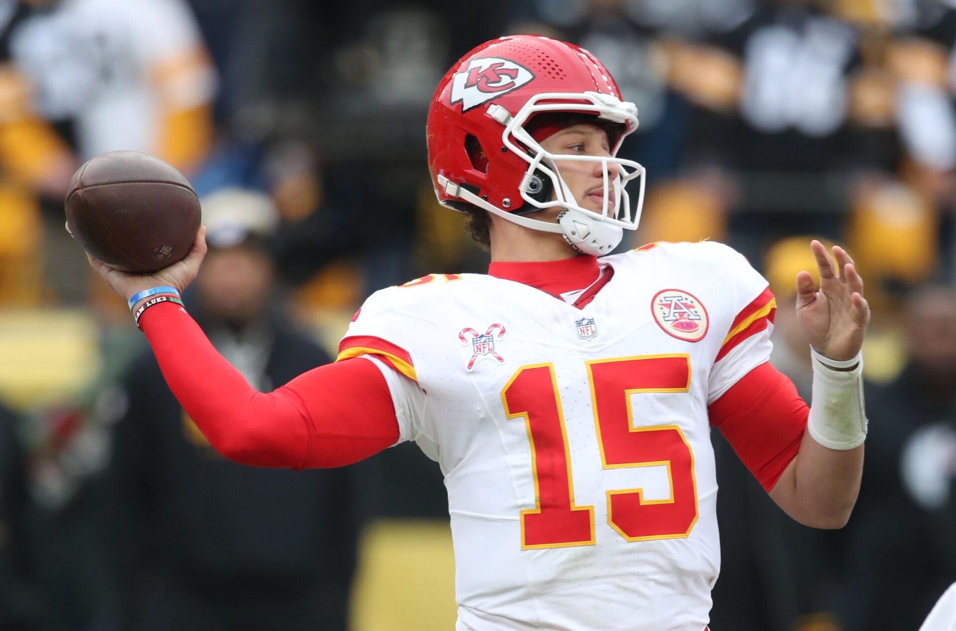 Dec 25, 2024; Pittsburgh, Pennsylvania, USA; Kansas City Chiefs quarterback Patrick Mahomes (15) passes against the Pittsburgh Steelers during the second quarter at Acrisure Stadium. Mandatory Credit: Charles LeClaire-Imagn Images