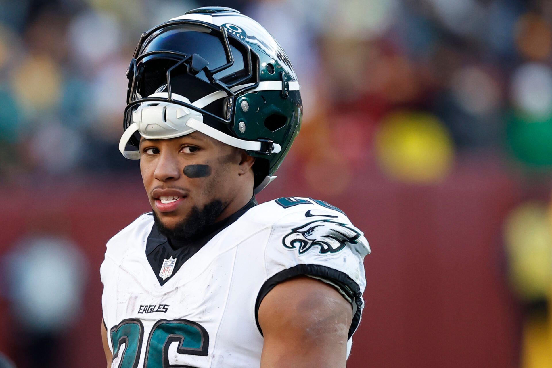 Dec 22, 2024; Landover, Maryland, USA; Philadelphia Eagles running back Saquon Barkley (26) stands on the field during a timeout against the Washington Commanders during the third quarter at Northwest Stadium. Mandatory Credit: Geoff Burke-Imagn Images