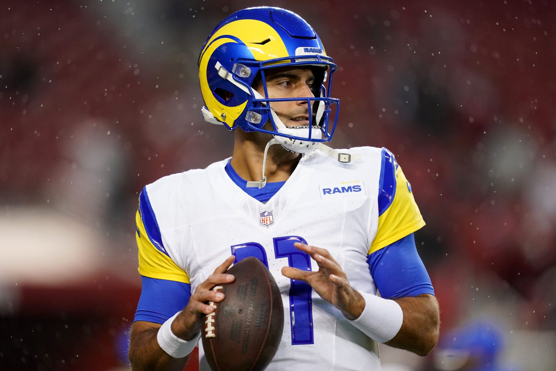 Dec 12, 2024; Santa Clara, California, USA; Los Angeles Rams quarterback Jimmy Garoppolo (11) warms up before the start of the game against the San Francisco 49ers at Levi's Stadium. Mandatory Credit: Cary Edmondson-Imagn Images