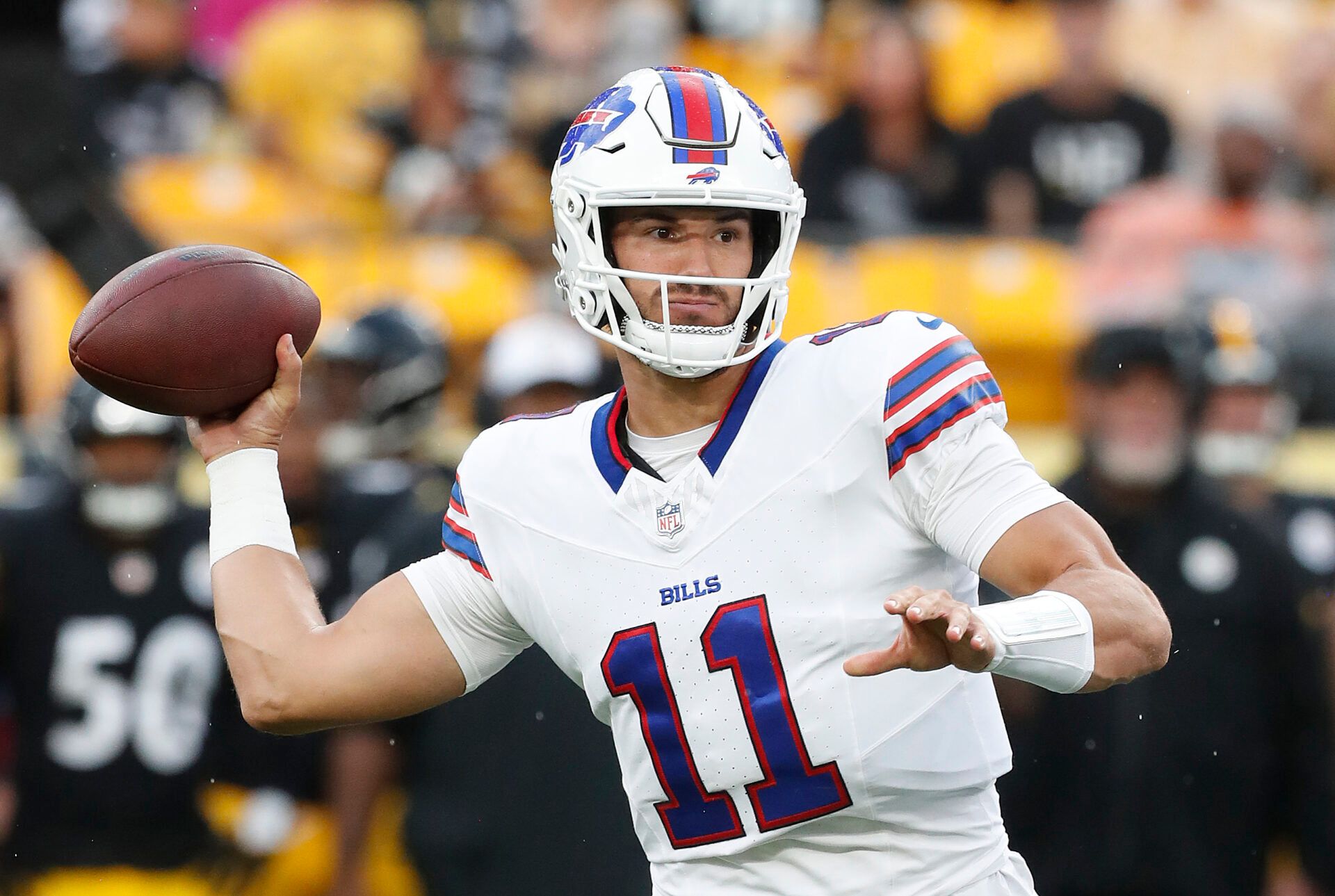 Aug 17, 2024; Pittsburgh, Pennsylvania, USA; Buffalo Bills quarterback Mitchell Trubisky (11) passes against the Pittsburgh Steelers during the first quarter at Acrisure Stadium. Mandatory Credit: Charles LeClaire-USA TODAY Sports