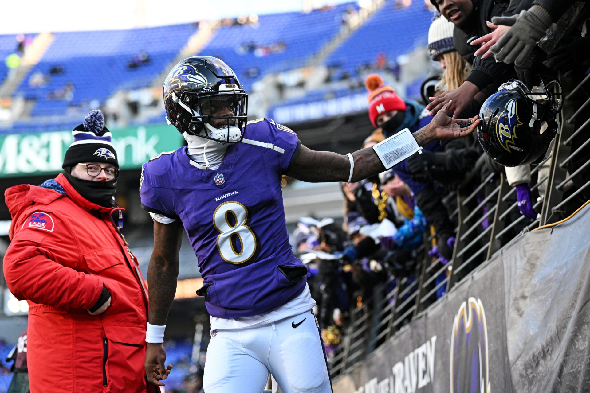 Jan 4, 2025; Baltimore, Maryland, USA; Baltimore Ravens quarterback Lamar Jackson (8) arrives before the game against the Cleveland Browns at M&T Bank Stadium. Mandatory Credit: Tommy Gilligan-Imagn Images