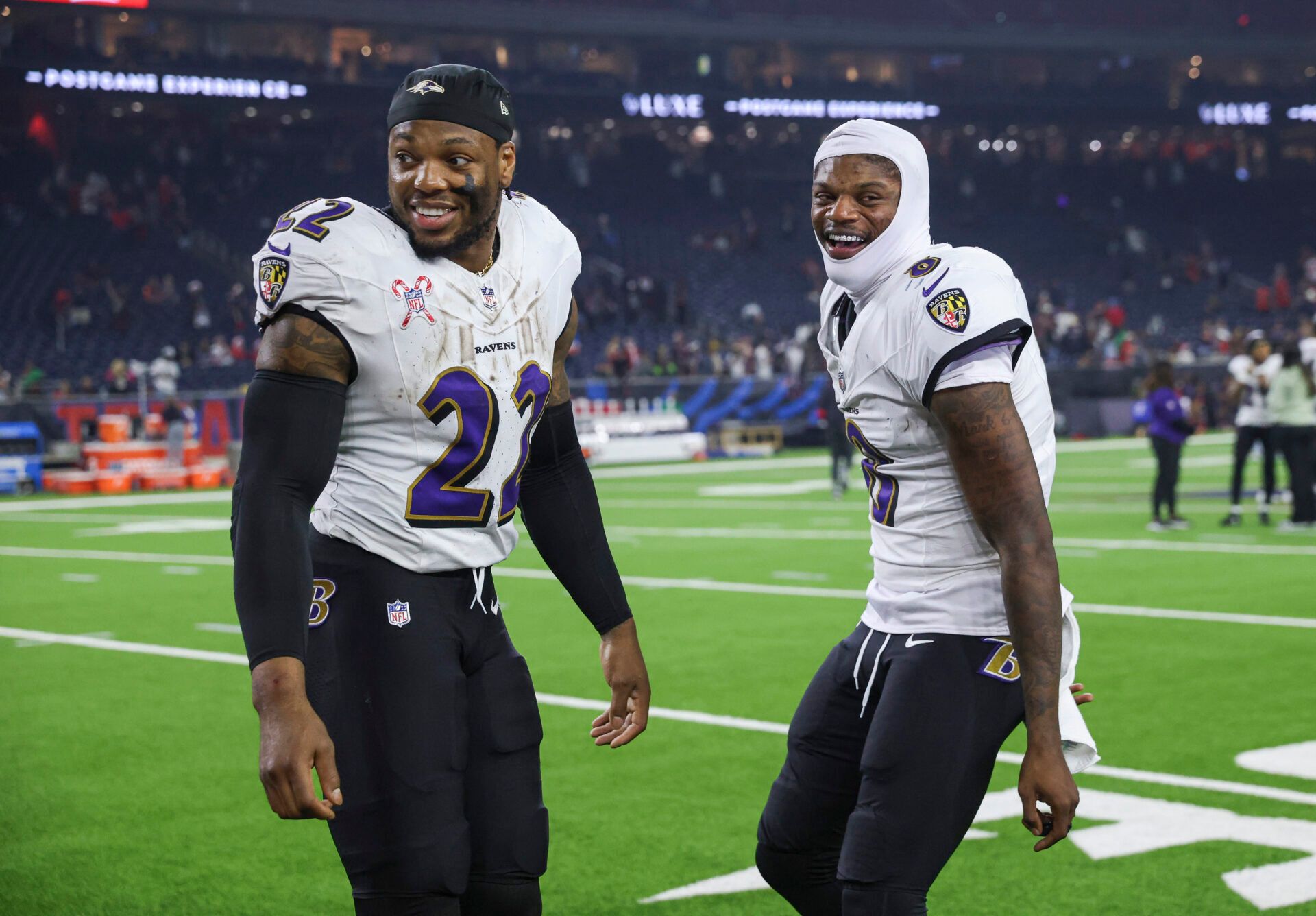 Dec 25, 2024; Houston, Texas, USA; Baltimore Ravens running back Derrick Henry (22) and quarterback Lamar Jackson (8) smile after the game against the Houston Texans at NRG Stadium. Mandatory Credit: Troy Taormina-Imagn Images