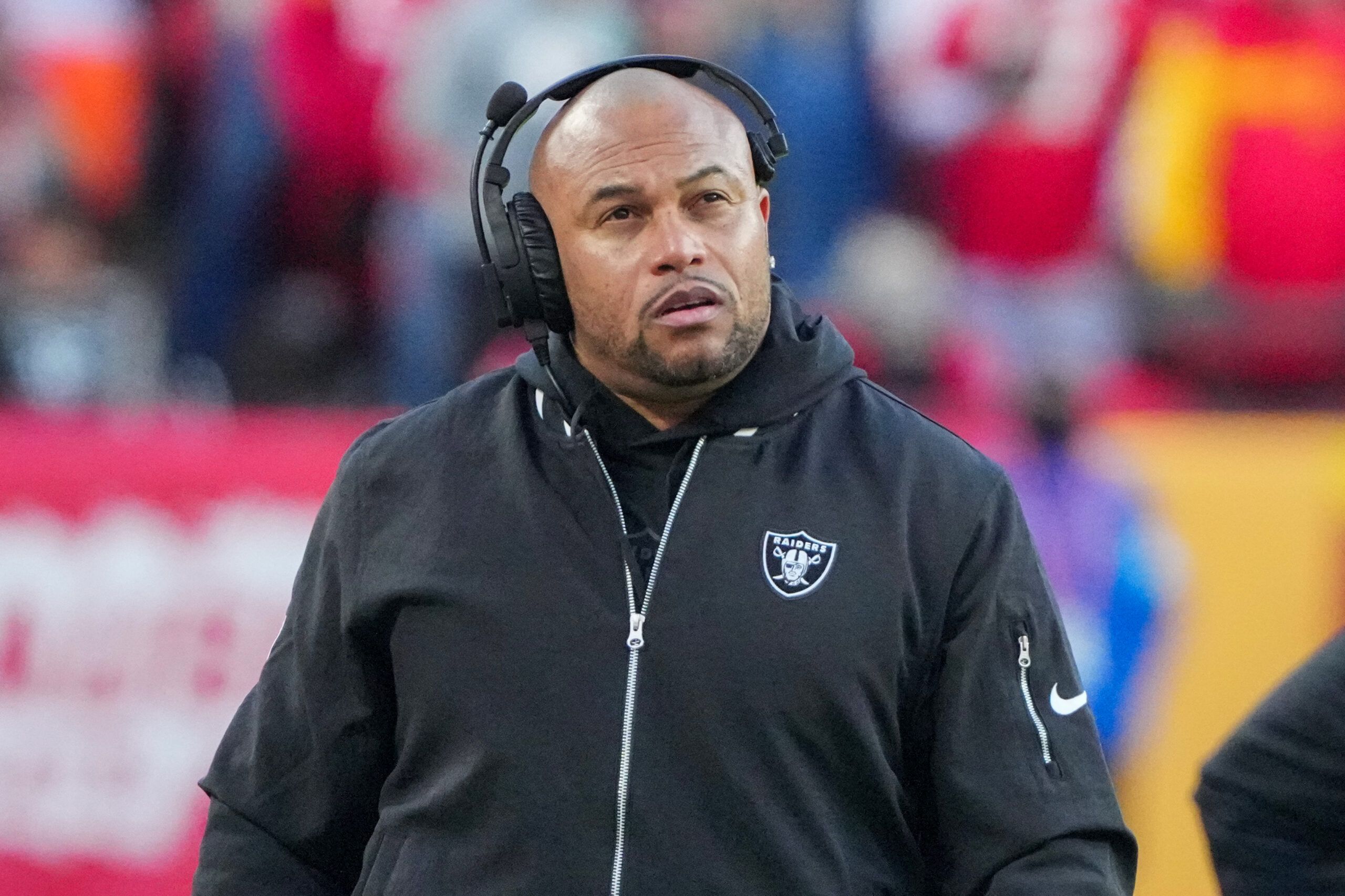 Nov 29, 2024; Kansas City, Missouri, USA; Las Vegas Raiders head coach Antonio Pierce watches play against the Kansas City Chiefs during the second half at GEHA Field at Arrowhead Stadium. Mandatory Credit: Denny Medley-Imagn Images