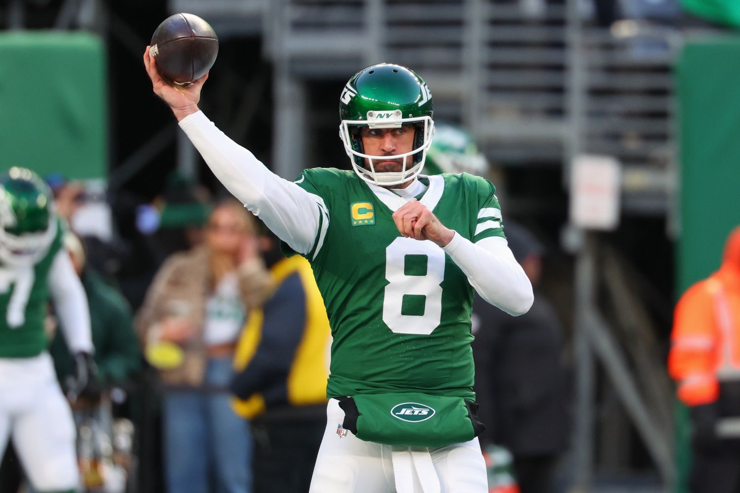 New York Jets quarterback Aaron Rodgers (8) throws a pass during pregame warmups for their game against the Miami Dolphins at MetLife Stadium.