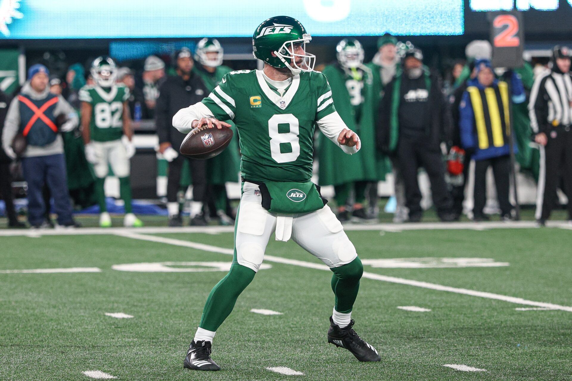 New York Jets quarterback Aaron Rodgers (8) throws a pass during the first half against the Miami Dolphins at MetLife Stadium.