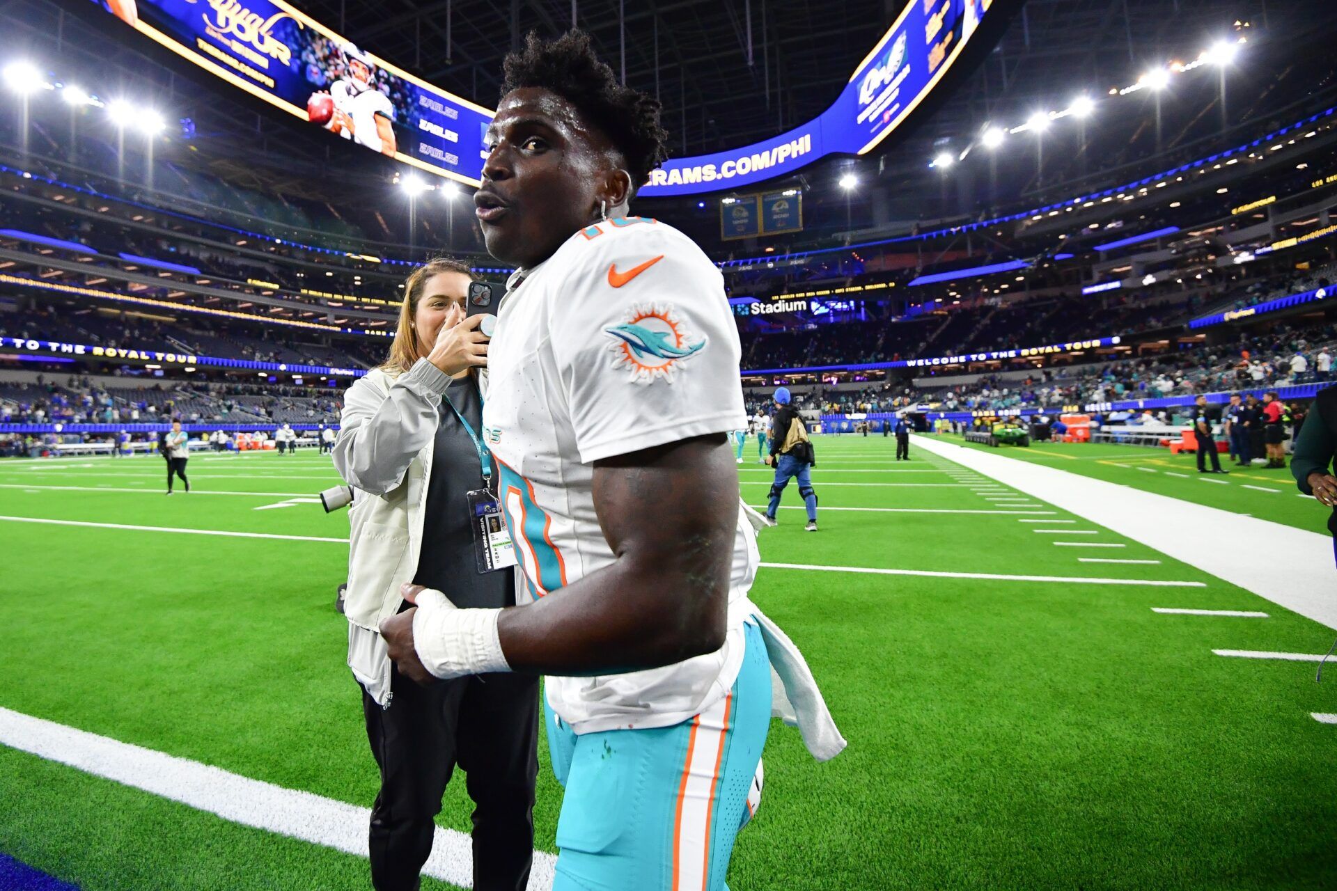 Miami Dolphins wide receiver Tyreek Hill (10) celebrates the victory against the Los Angeles Rams at SoFi Stadium.