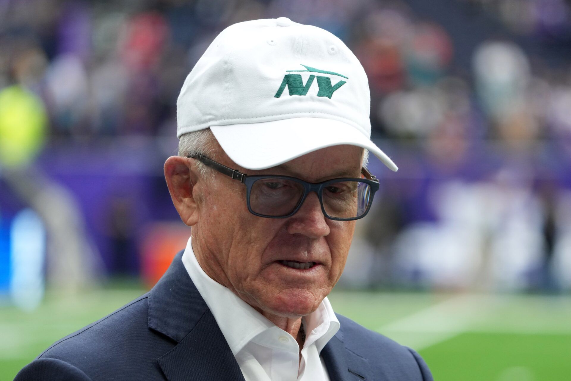 New York Jets owner Woody Johnson reacts during the game against the Minnesota Vikings at Tottenham Hotspur Stadium.