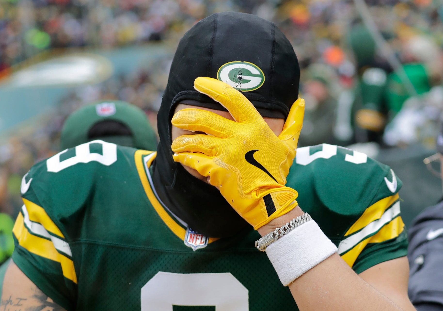 Green Bay Packers wide receiver Christian Watson (9) leaves the field on a cart after getting injured against the Chicago Bears in the second quarter during their football game Sunday, January 5, 2025, at Lambeau Field in Green Bay, Wisconsin.